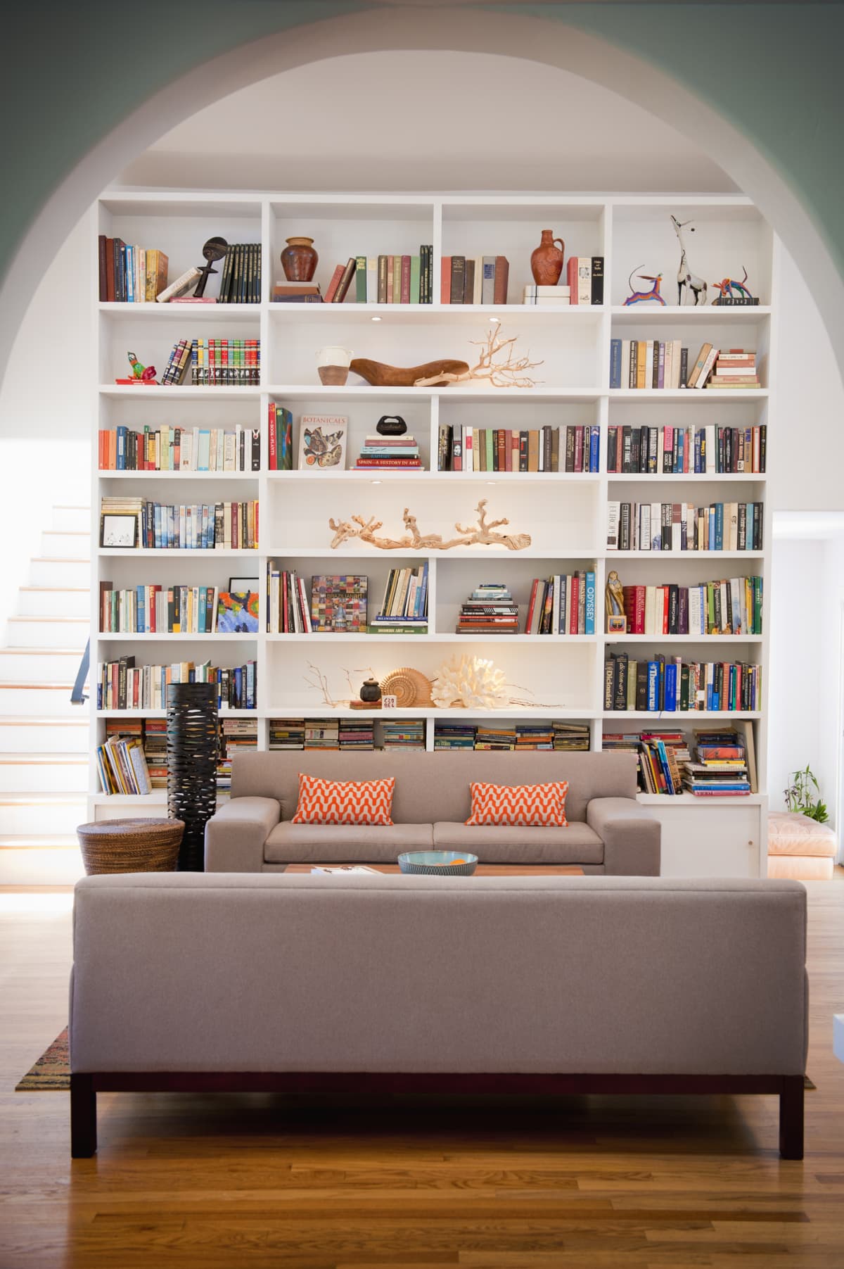 Wall-to-wall shelves in living room