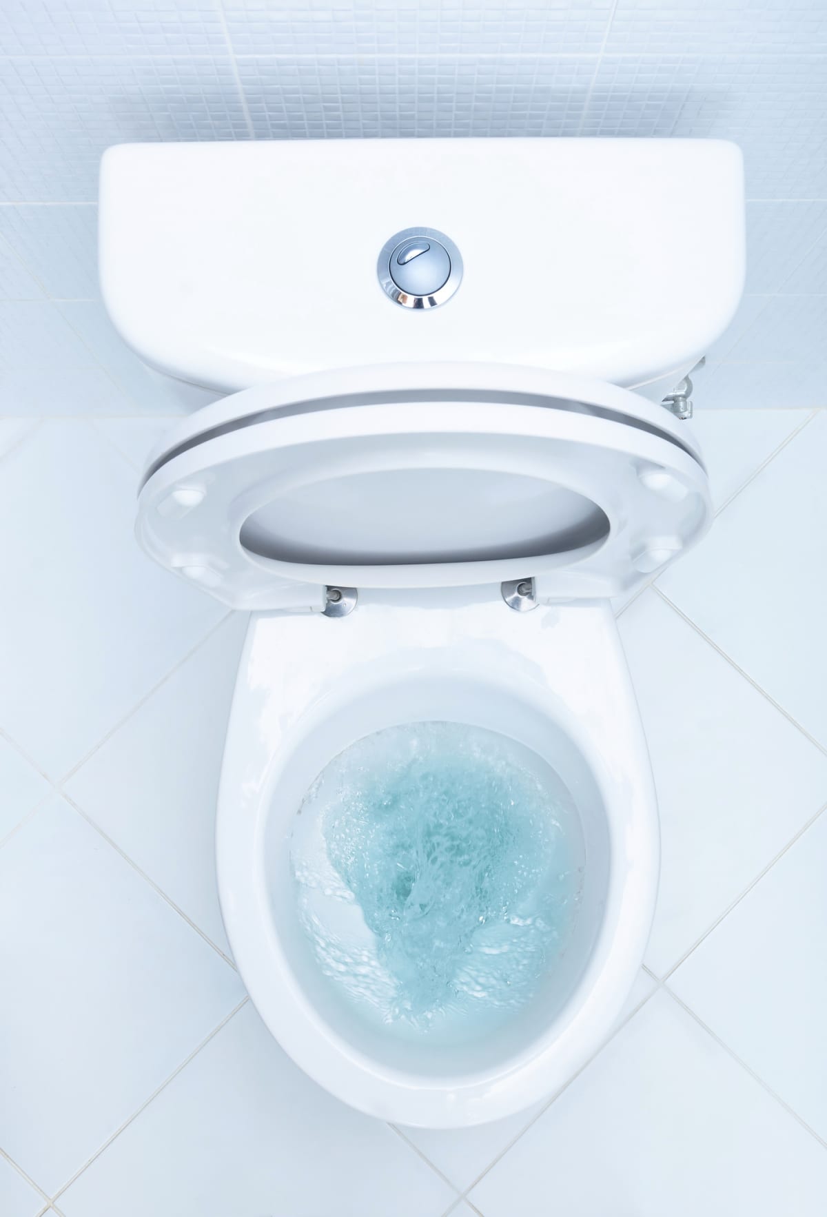 A clean, stain-free toilet in the bathroom