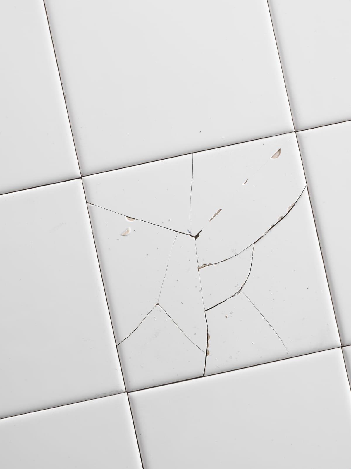 Cracked white tile