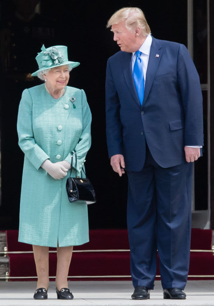 WINDSOR, ENGLAND - JULY 13:  Queen Elizabeth II and President of the United States, Donald Trump inspect a n honour guard at Windsor Castle on July 13, 2018 in Windsor, England.  Her Majesty welcomed the President and Mrs Trump at the dais in the Quadrangle of the Castle. A Guard of Honour, formed of the Coldstream Guards, gave a Royal Salute and the US National Anthem was played. The Queen and the President inspected the Guard of Honour before watching the military march past. The President and First Lady then joined Her Majesty for tea at the Castle.  (Photo by Chris Jackson/Getty Images)