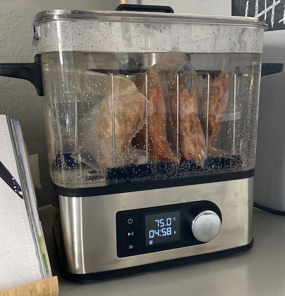 Meat cooking inside a sous vide cooker
