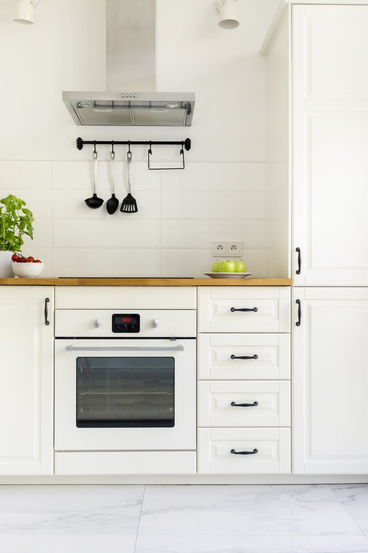 A white kitchen with appliances