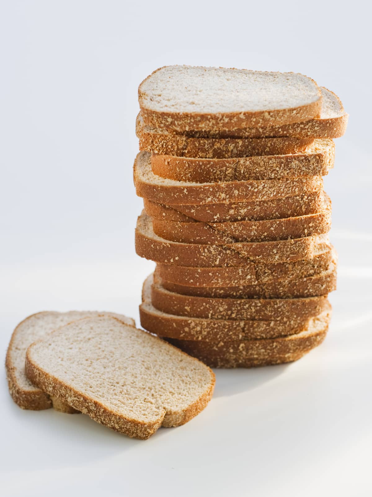 Sliced whole wheat bread in a stack