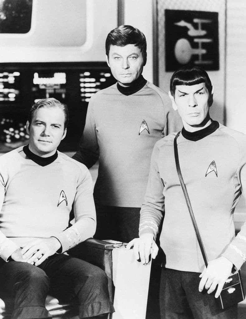 (Original Caption) William Shatner (L), DeFrost Kelley (C) and Leonard Nimoy went 200 years into the future each week on "Star Trek," the innovative series which remains a cult show years after its acclaimed run on NBC-TV (1966-69). The trio is shown here posing in costume. Undated publicity photo. BPA#2 4316
