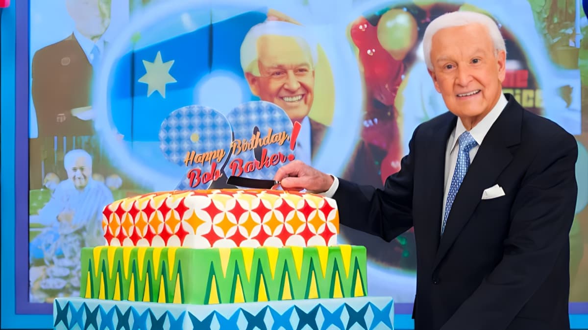 Bob Barker smiling on the set of The Price Is Right