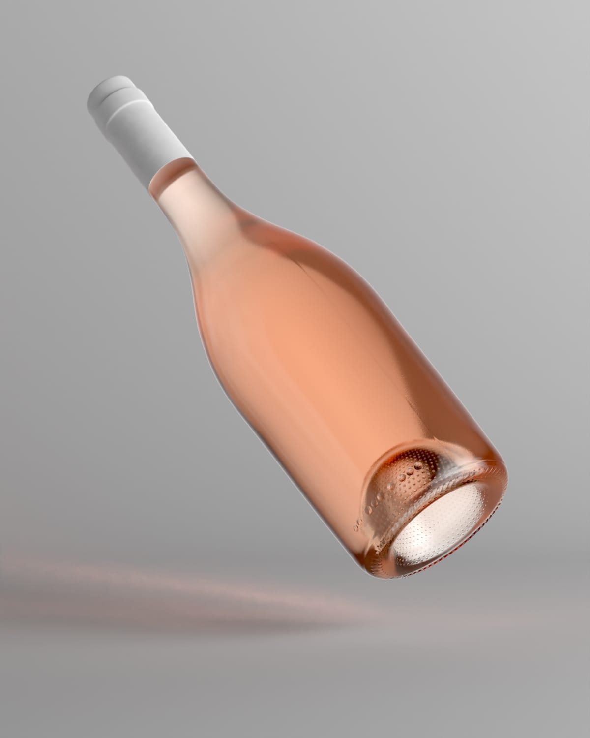 Bottle of rose wine floating against a grey background
