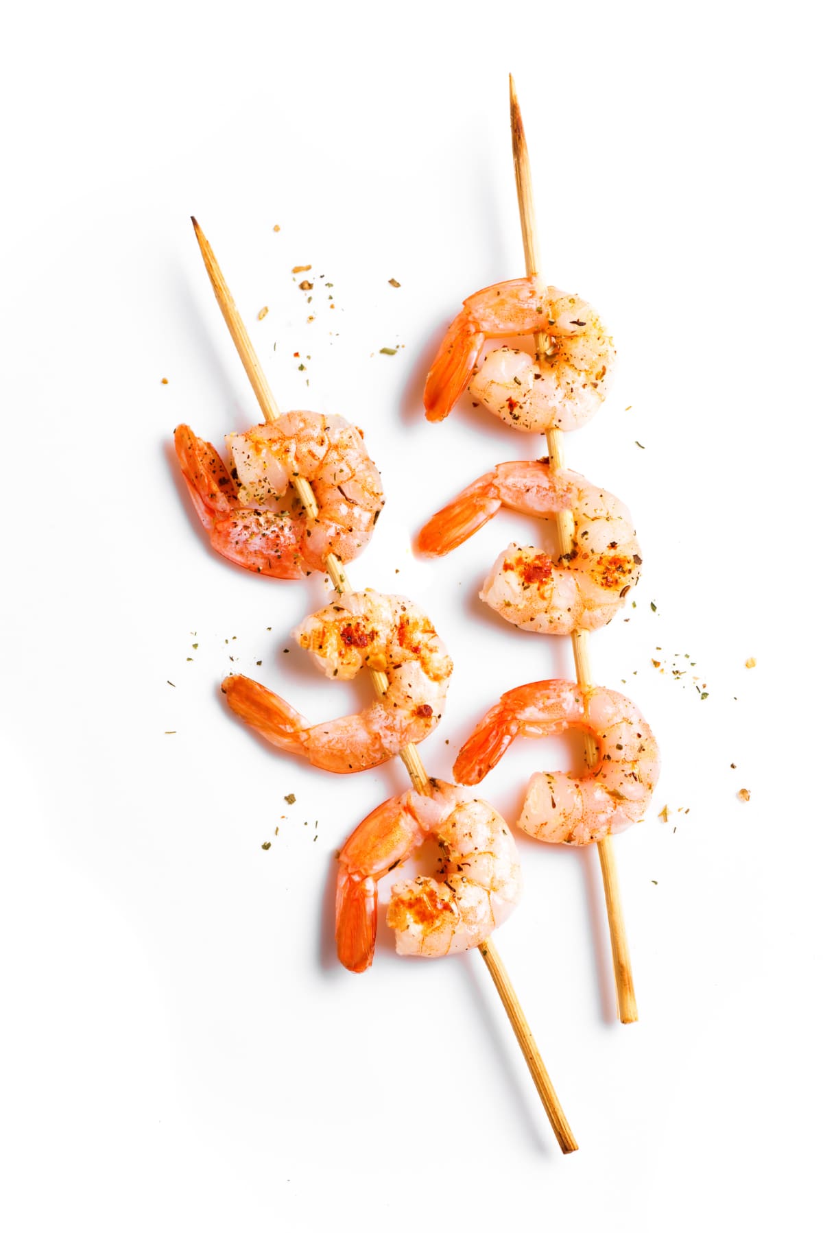 Grilled Shrimp Skewers isolated on white background. Fried spicy prawn seafood on sticks, design element.