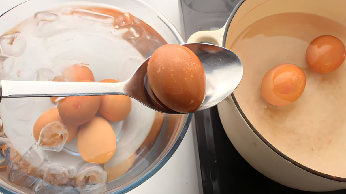 A hard-boiled egg on a spoon