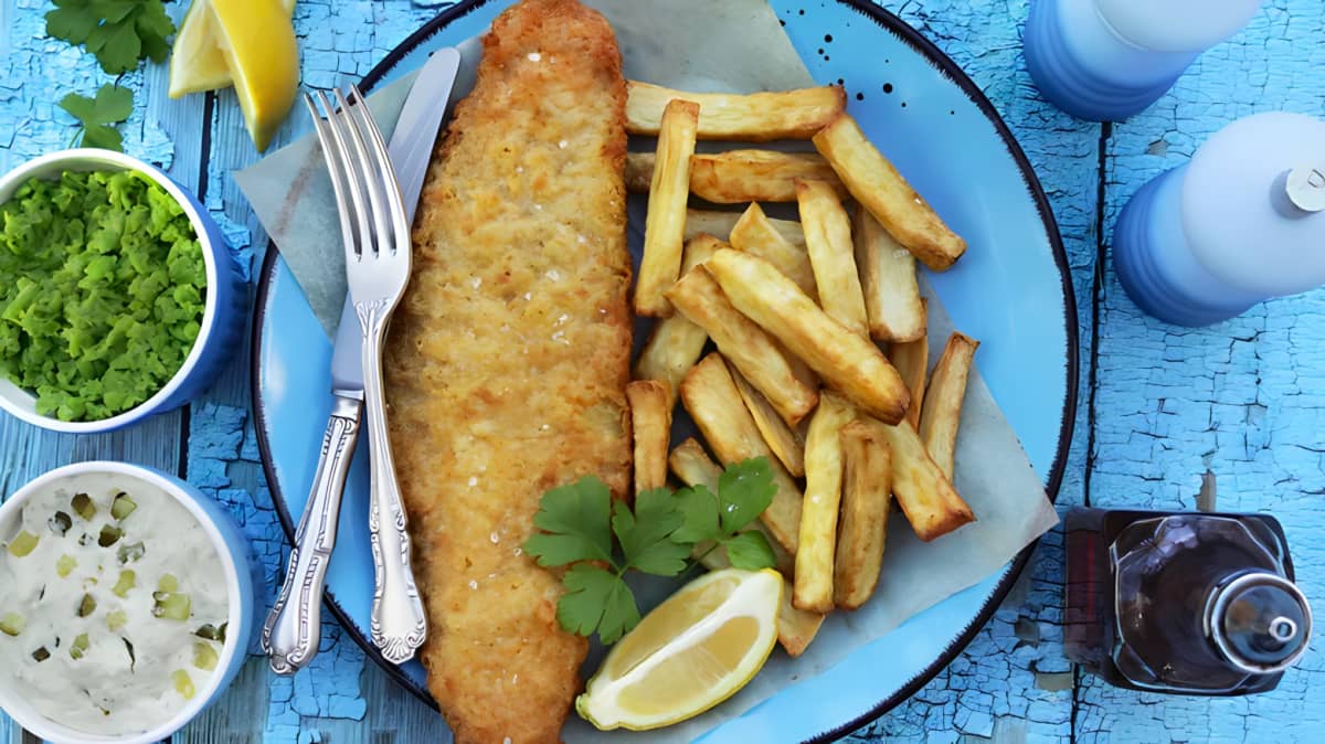 Fried fish with french fries on a plate