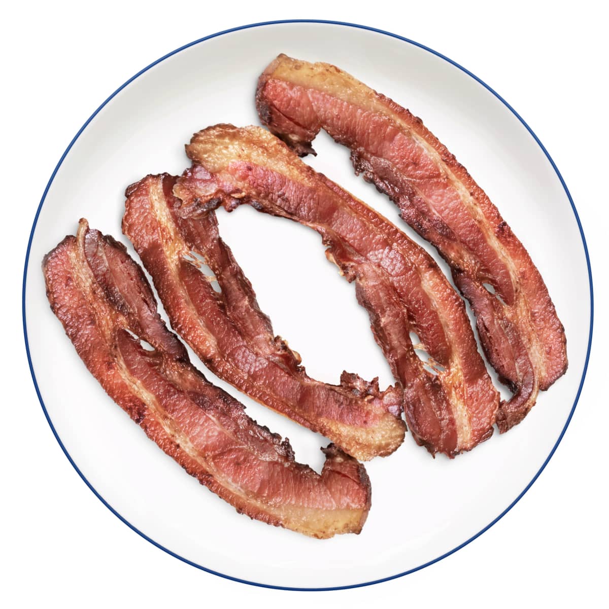 Distinct slices of freshly cooked bacon
