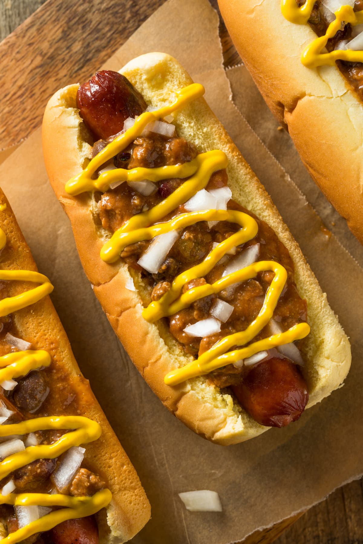 Homemade Detroit style chili dog with mustard and onion