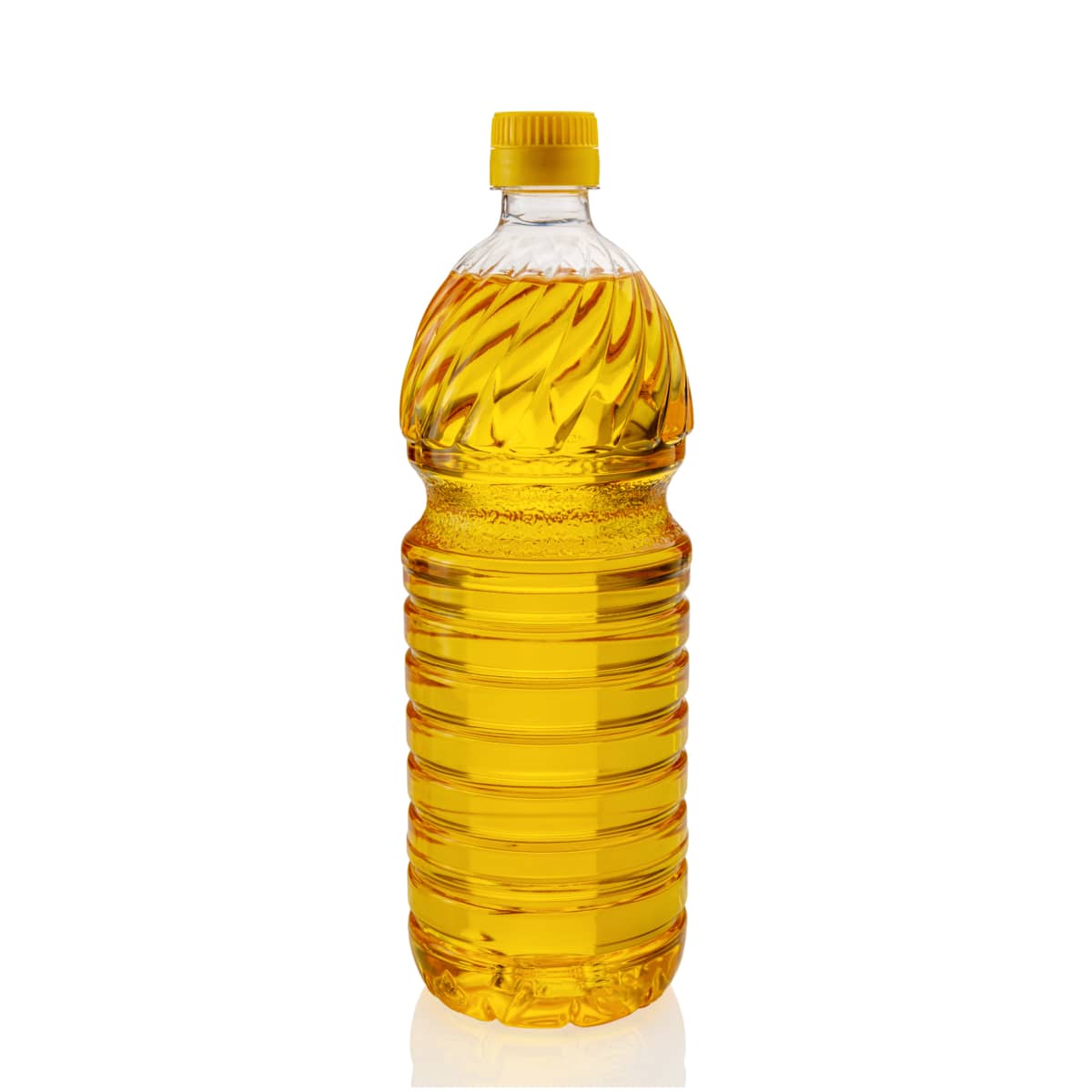 Vegetable oil in plastic bottle, corn oil for frying and cooking, isolated on white