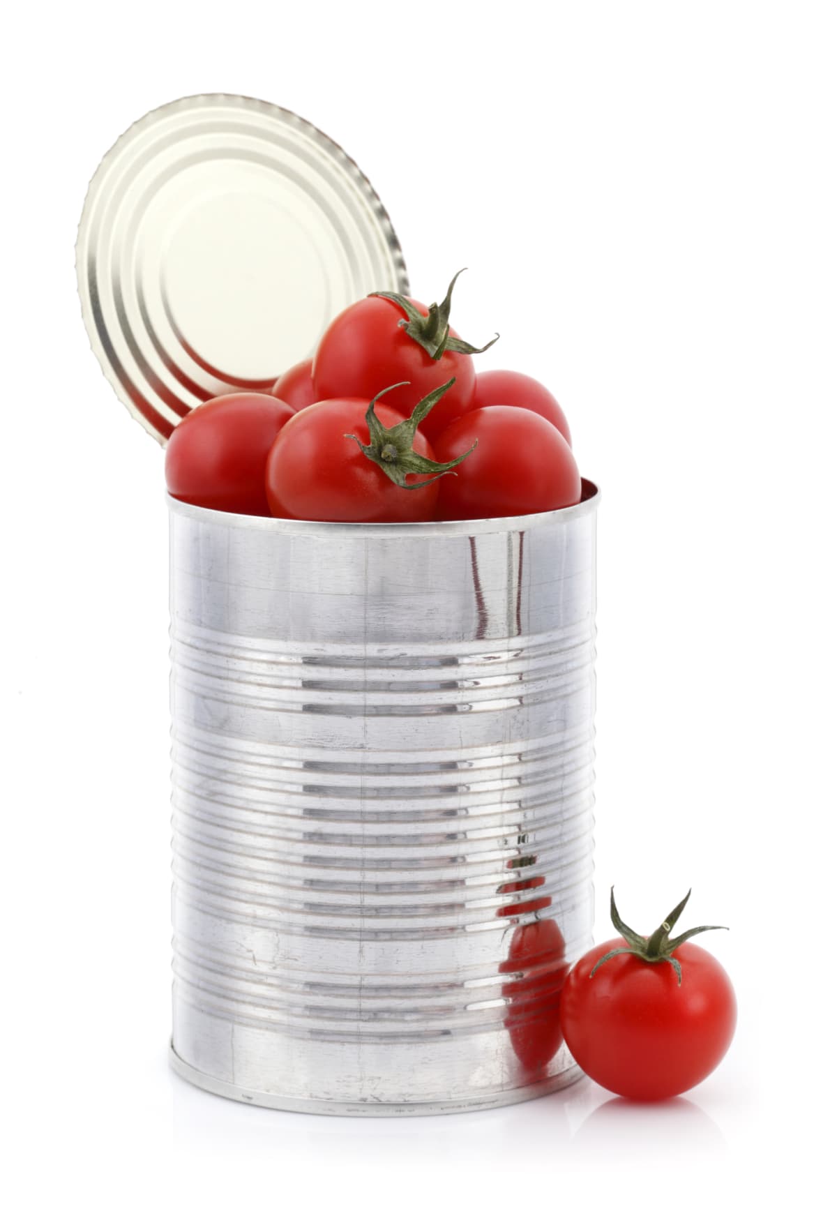 Open tin can with fresh tomatoes