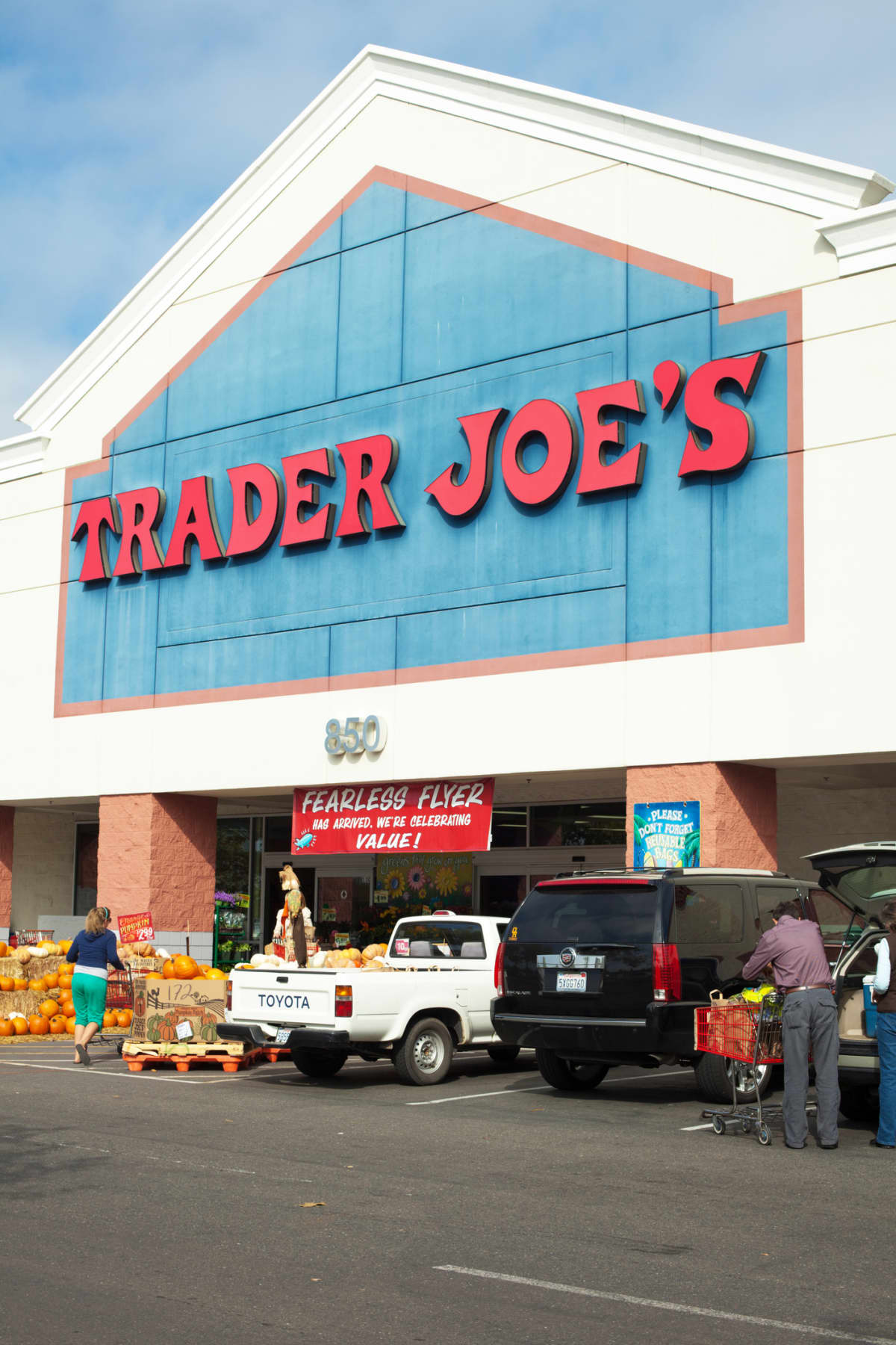 Folsom, California, USA - October 19, 2011: Storefront view of a Trader Joe's grocery store with parked cars and shoppers going in and out.  Trader Joe's is a privately held chain of specialty grocery stores .The first Trader Joe's store opened in Pasadena, California in 1967 and today there are over 360 stores in 29 states.