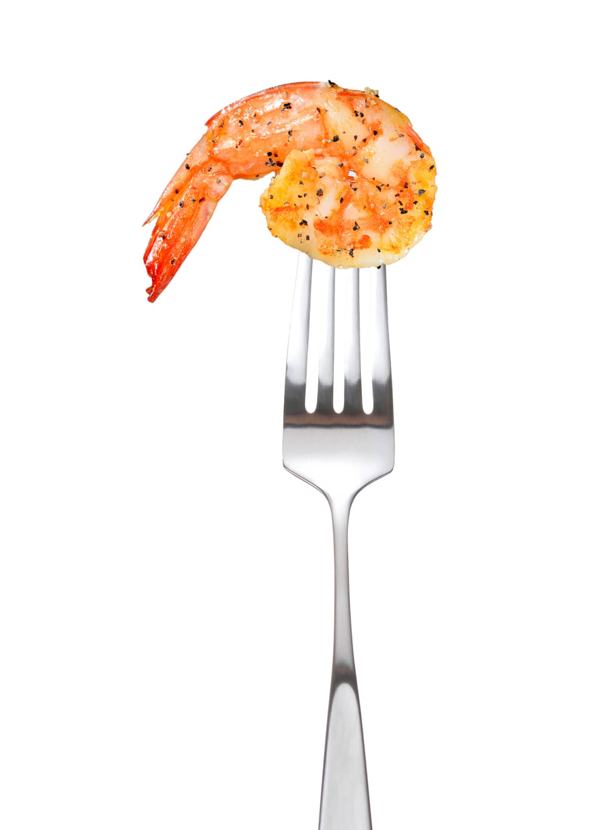 Cooked shrimp on fork isolated on white background