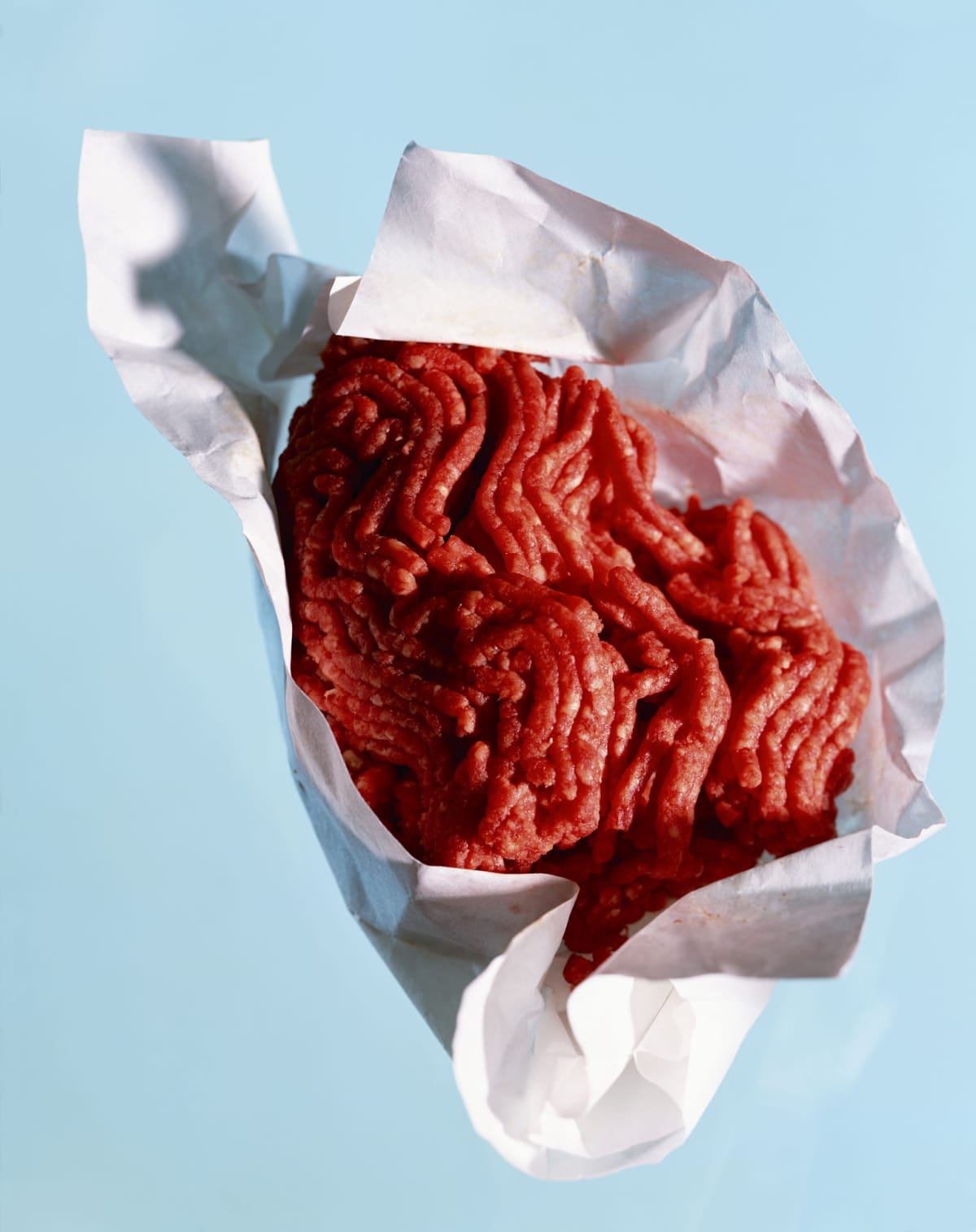 An open pack of ground beef