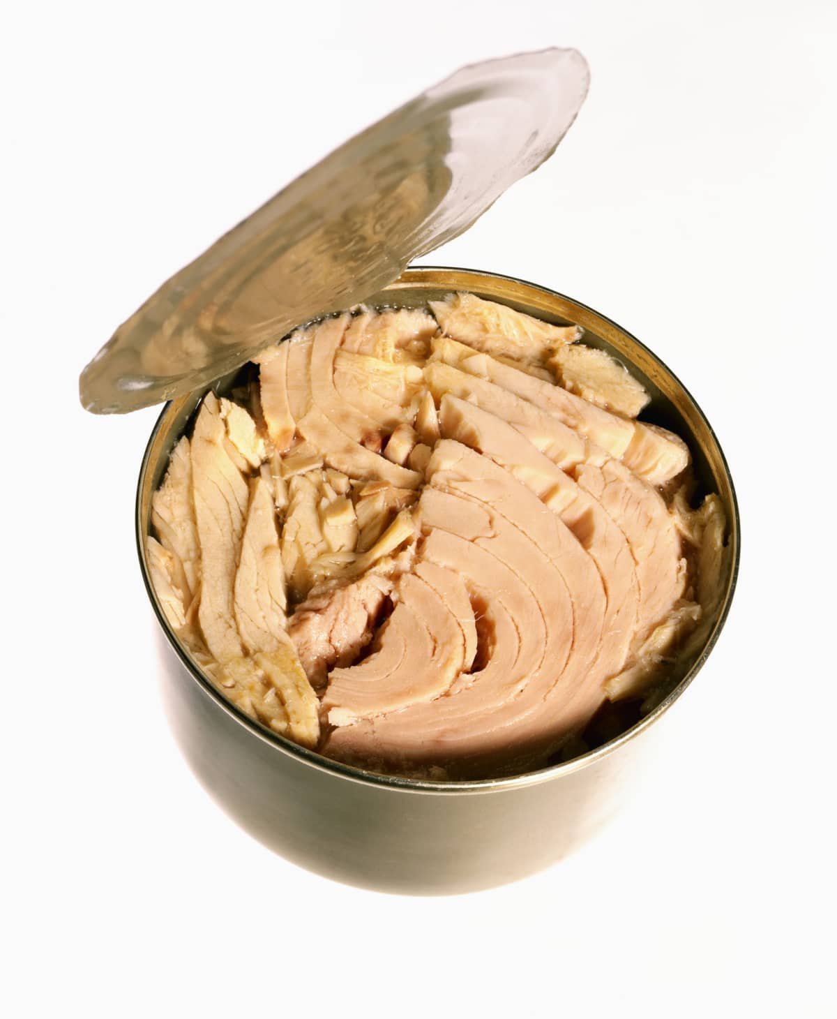 Open can of tuna with lid partially peeled back on a white background.
