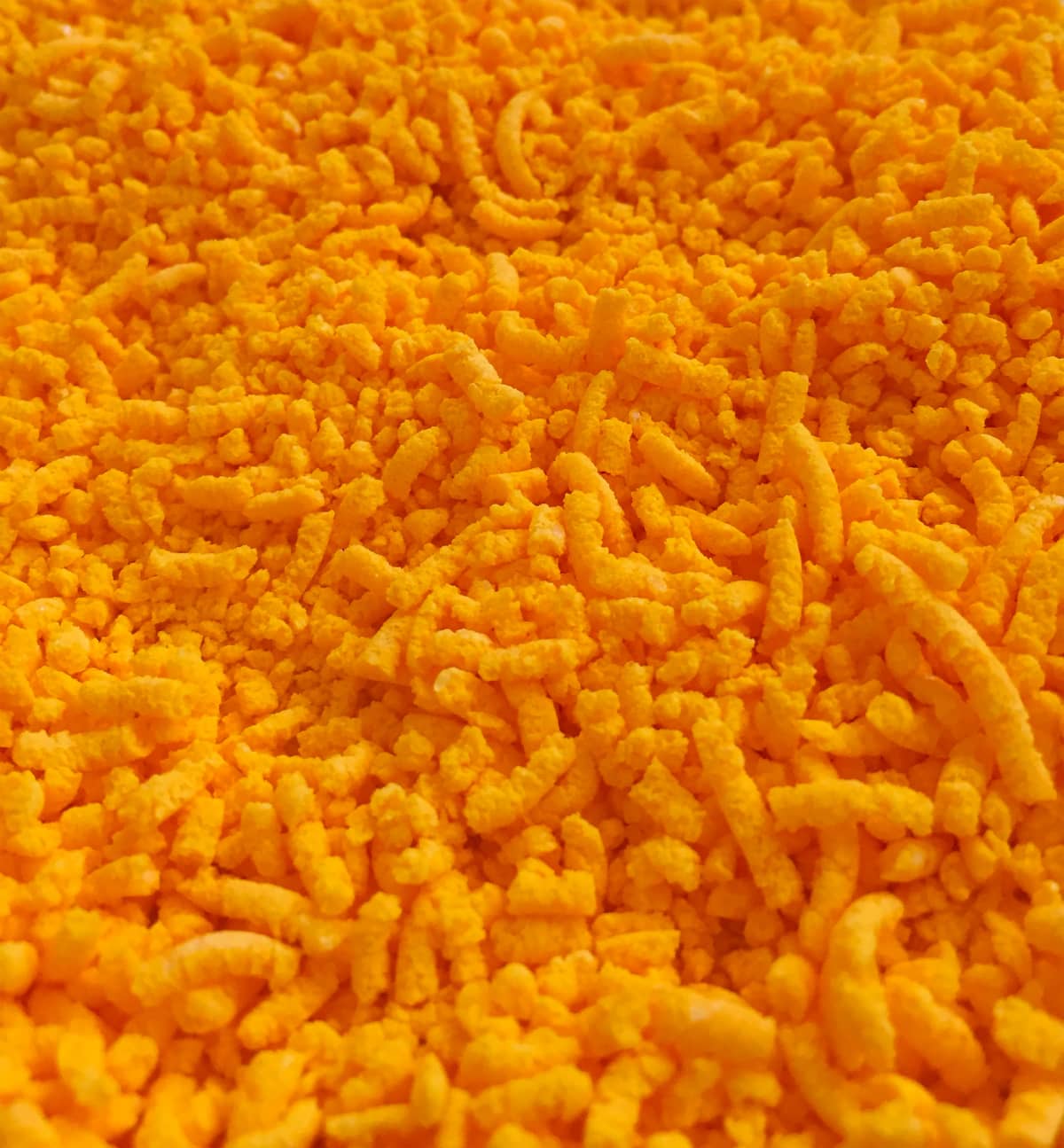 A bunch of cheese puffs