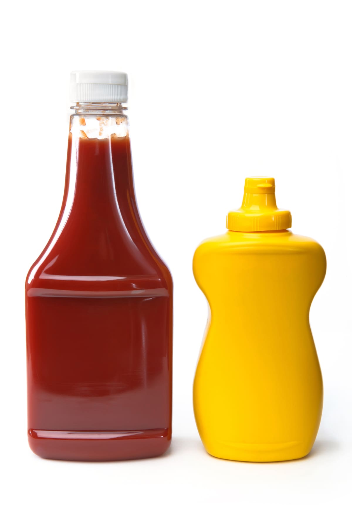 Ketchup and Mustard bottles on white background
