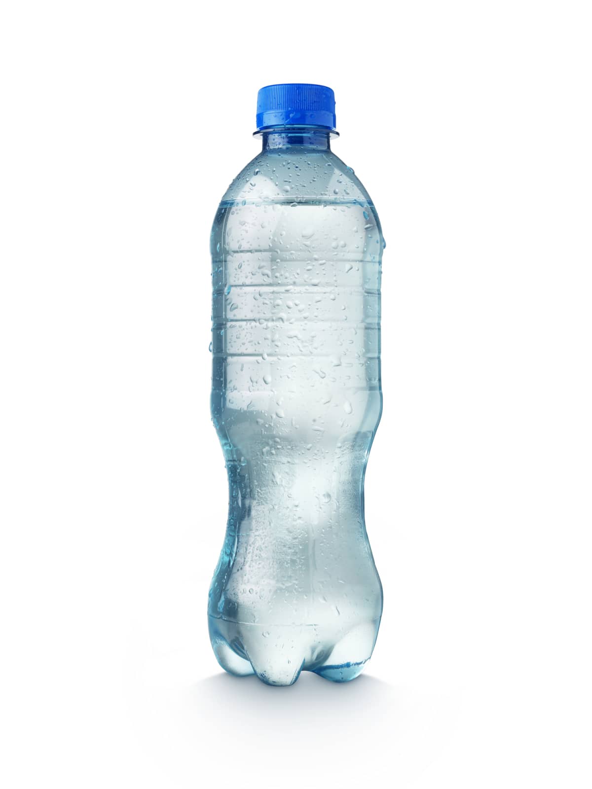 Shot of a clear plastic bottle containing mineral water with fresh droplets of water and cut out with a clipping path with copy space for the designer. On a white background.