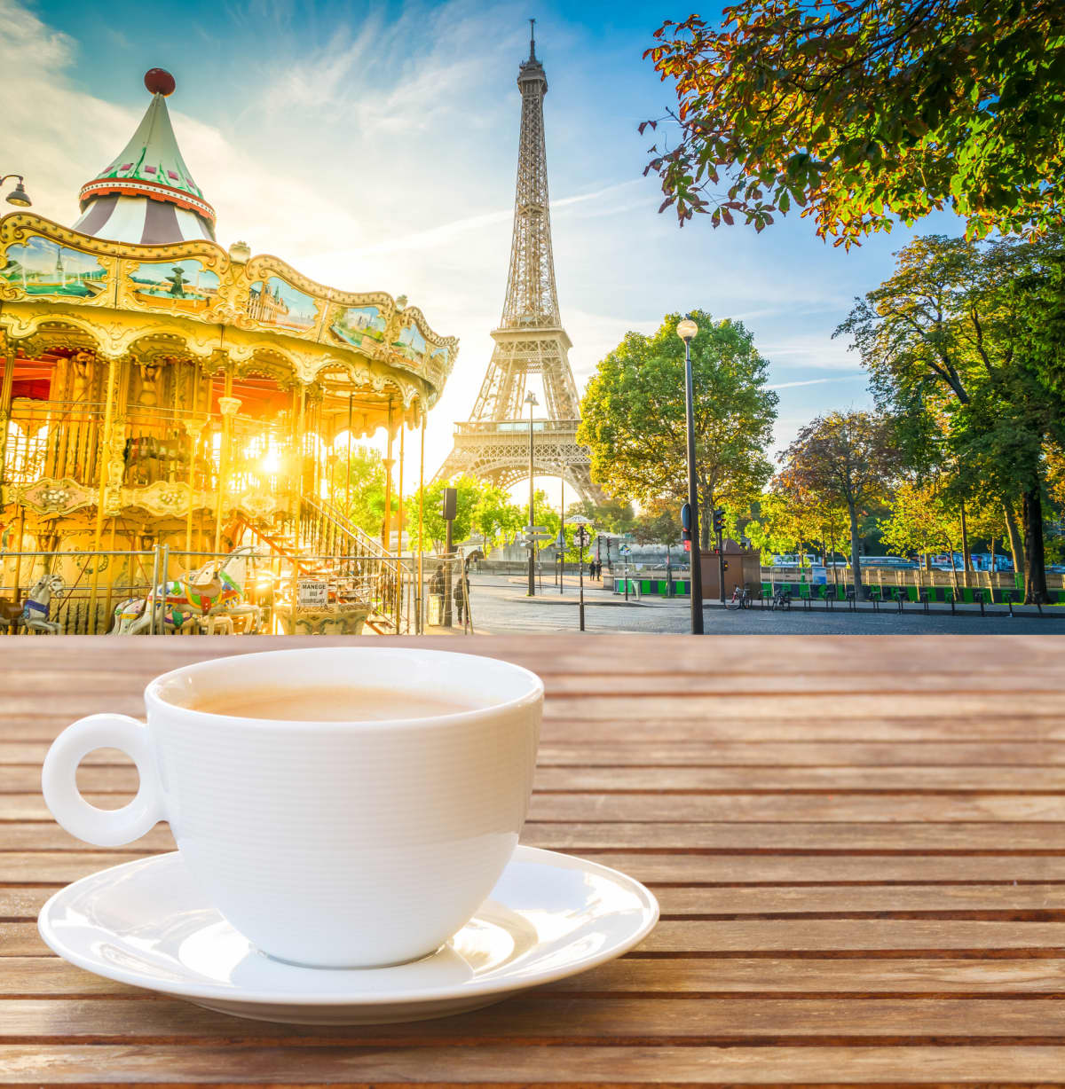 View of Paris landmarks behind a mug of coffee