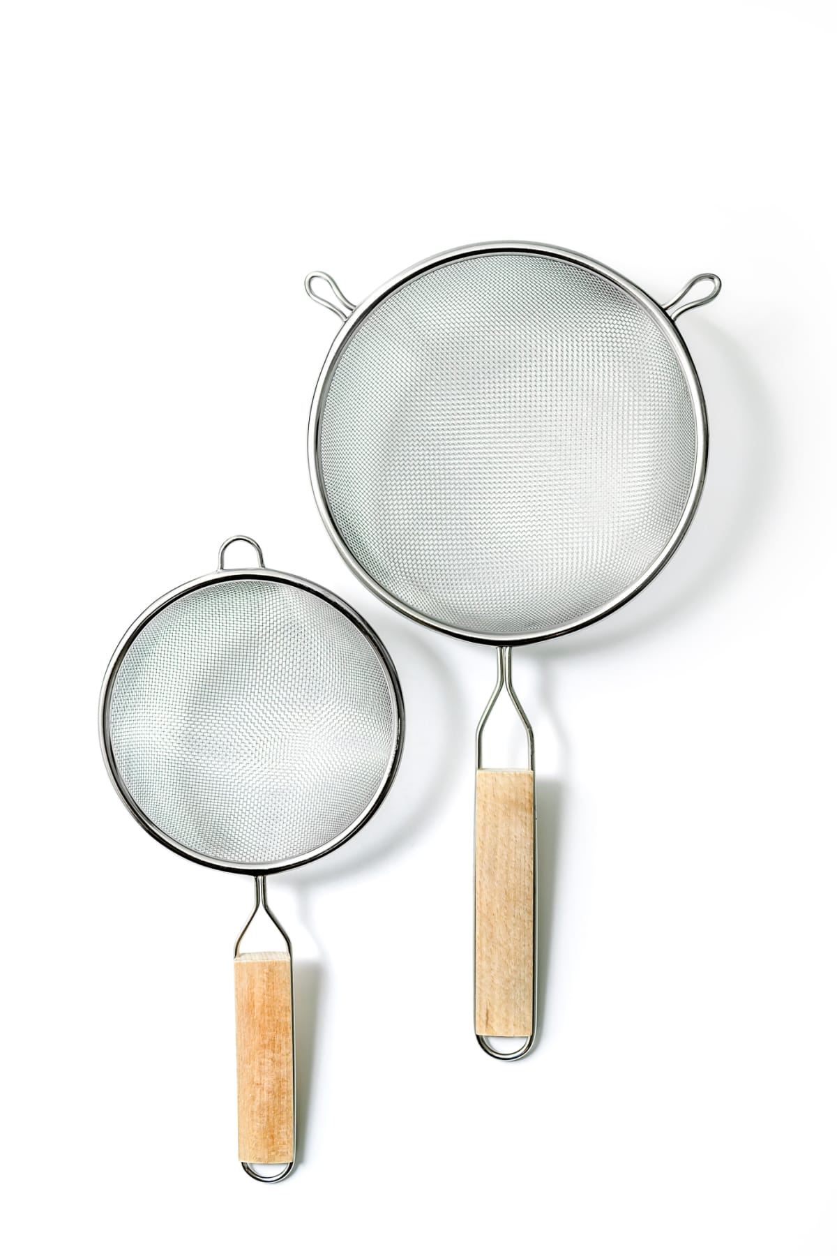 two metal sieves of different sizes