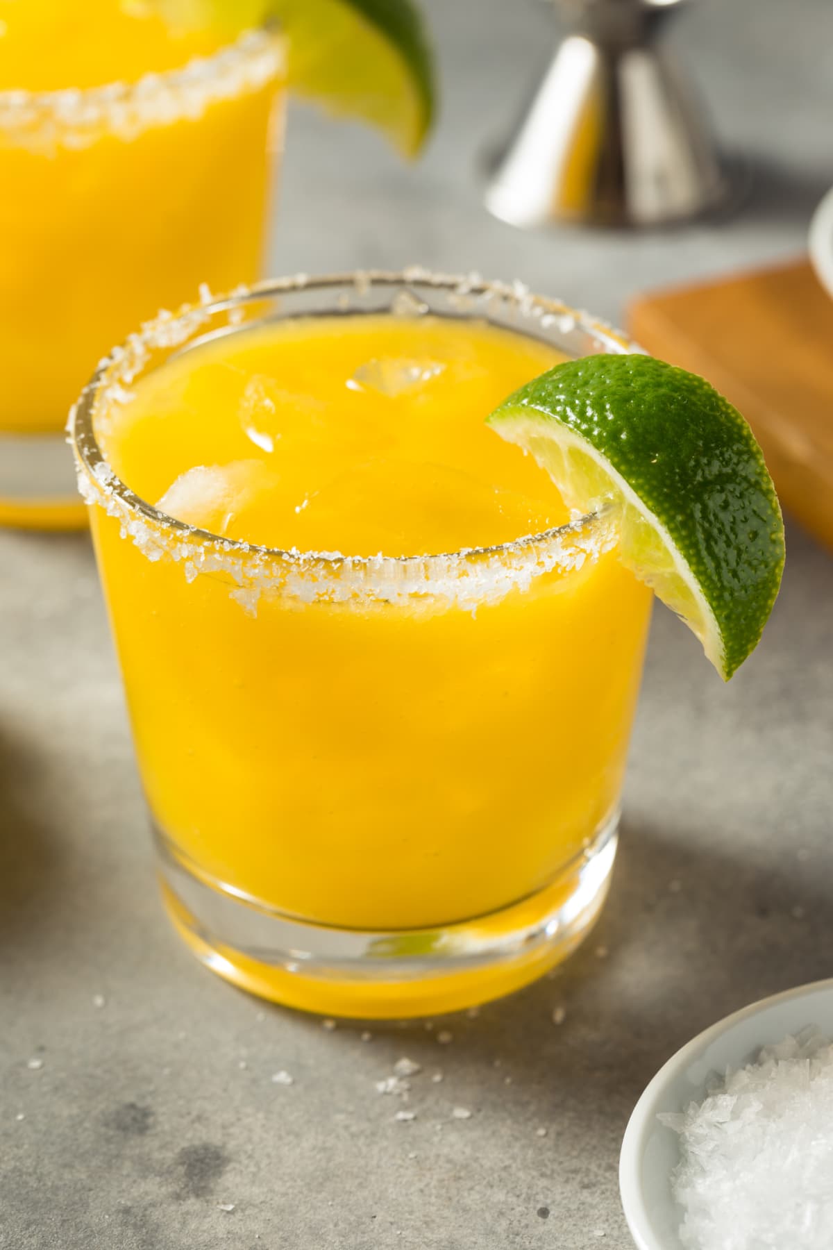 Boozy Cold Mango Margarita Cocktail with Lime and Salt