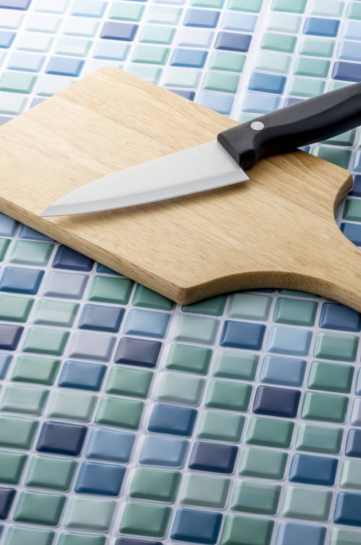 A knife on top of a cutting board