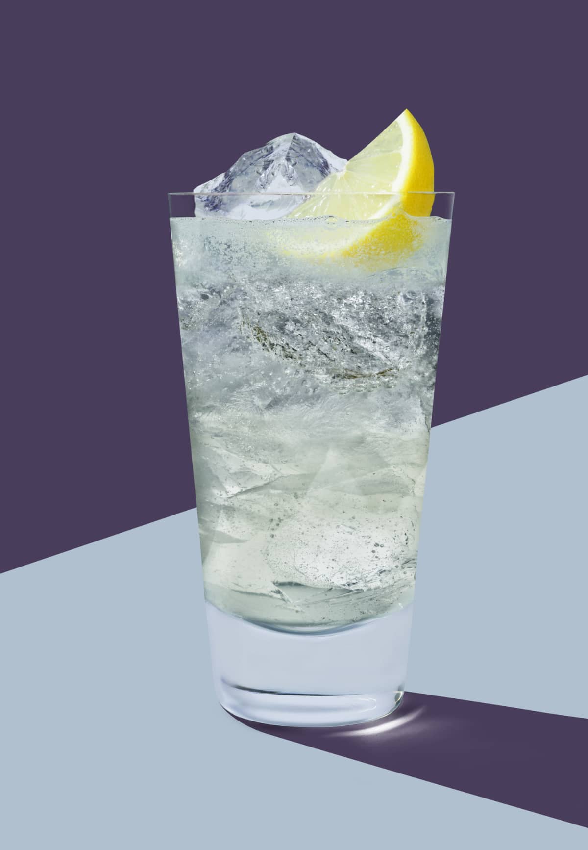 Tom Collins cocktail shot in flat art deco style on graphic purple and pale blue background with defined shadow