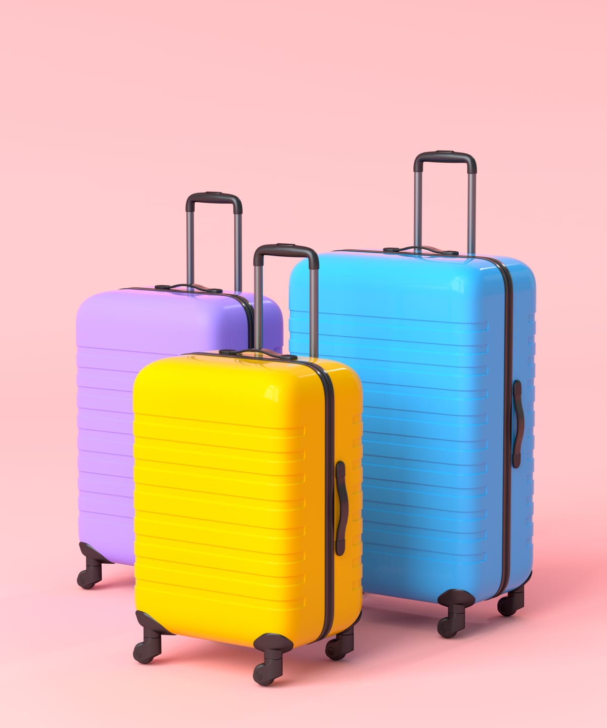 Three colorful hard shell suitcases set upright against a light purple background