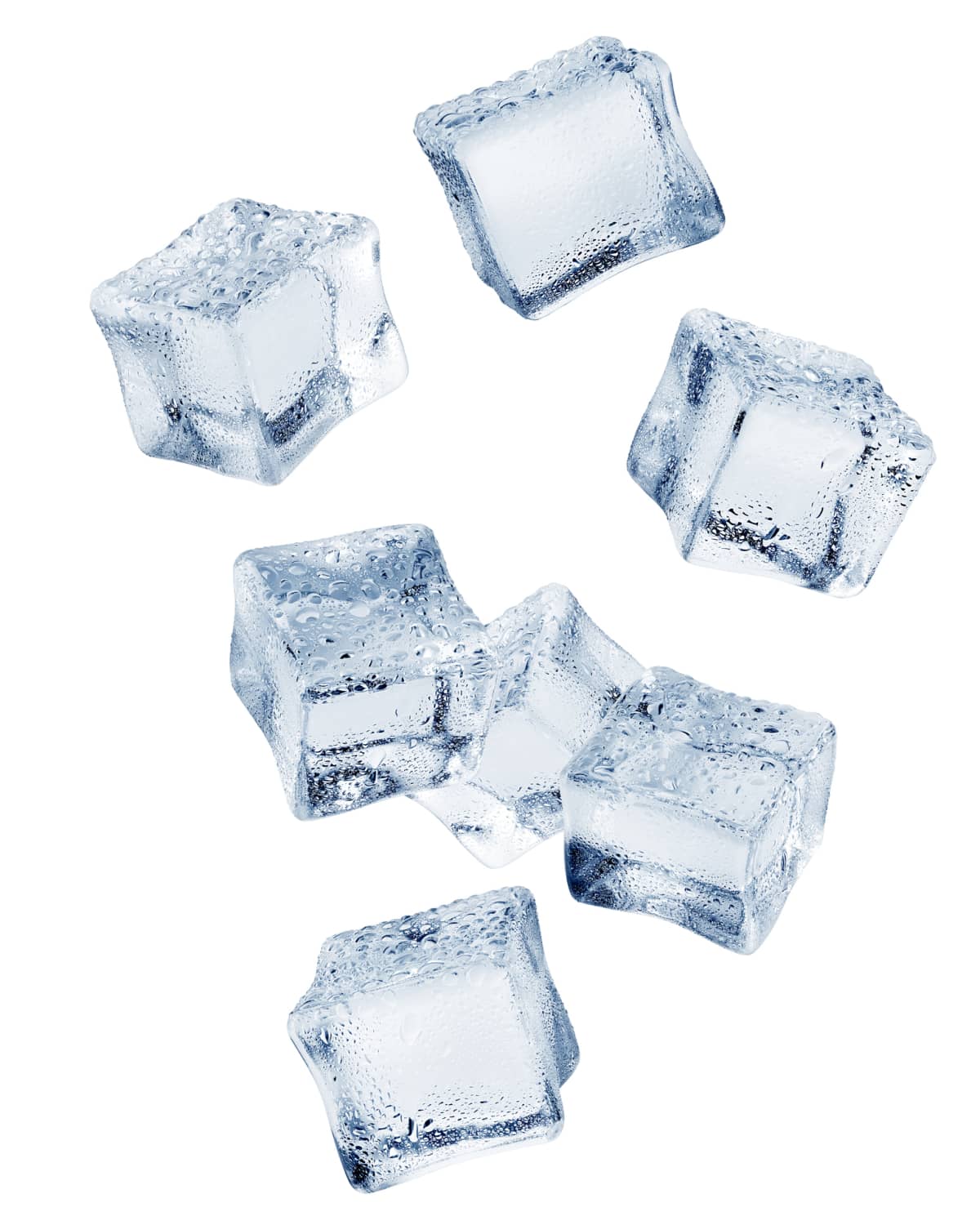Falling ice cubes isolated on white background