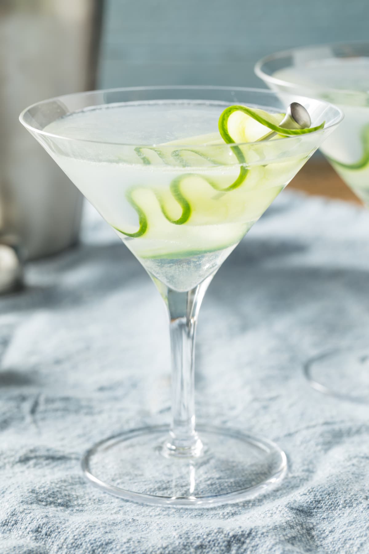 Sake martini garnished with cucumber