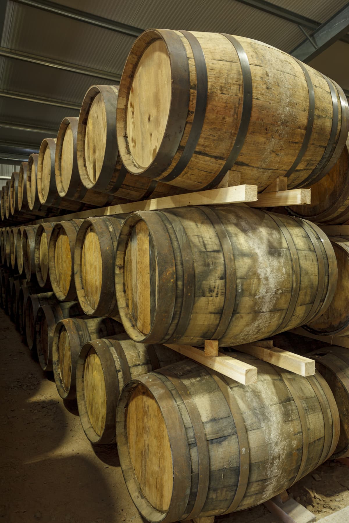 Whiskey barrels stacked