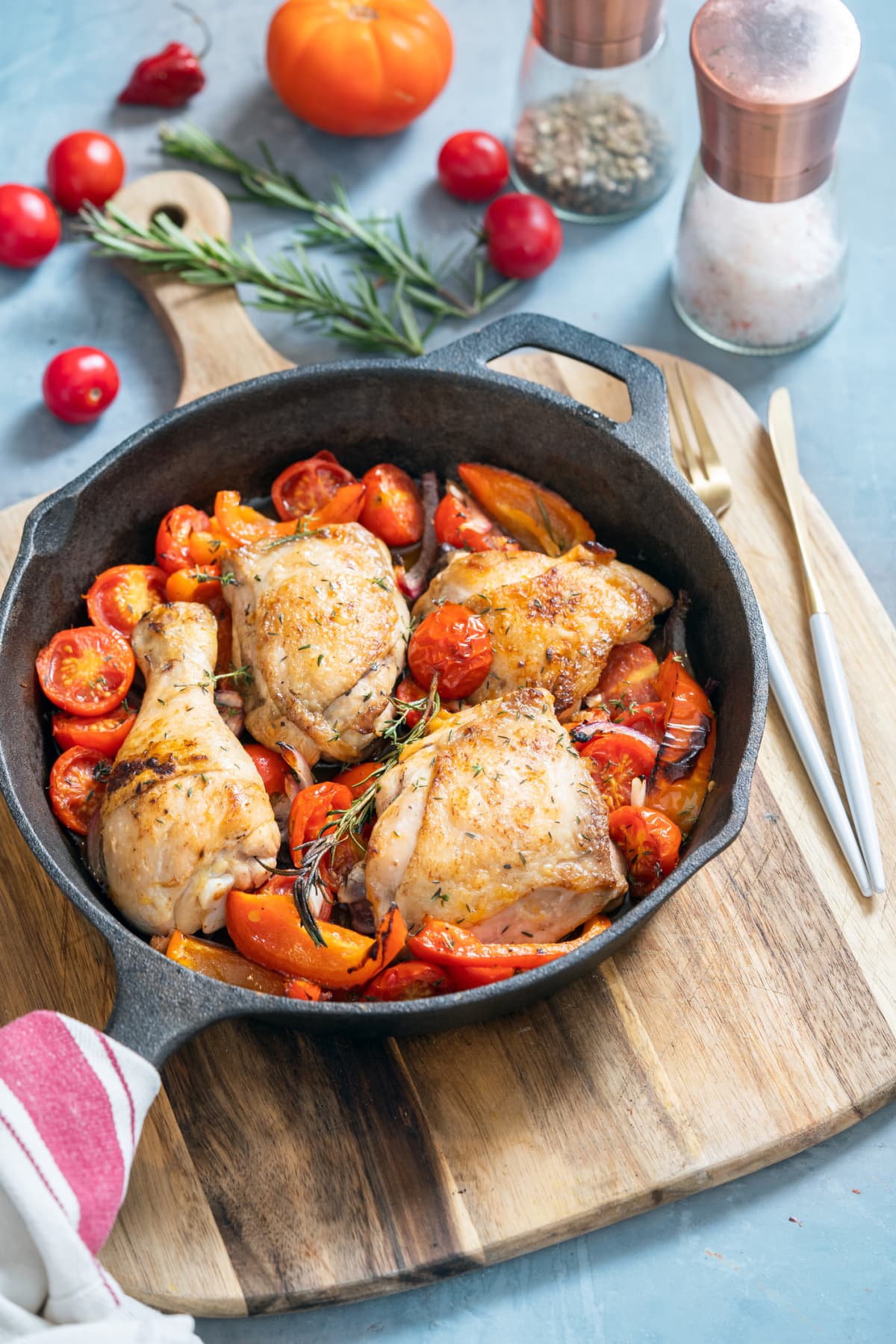 Braised chicken in a cast iron pan. 