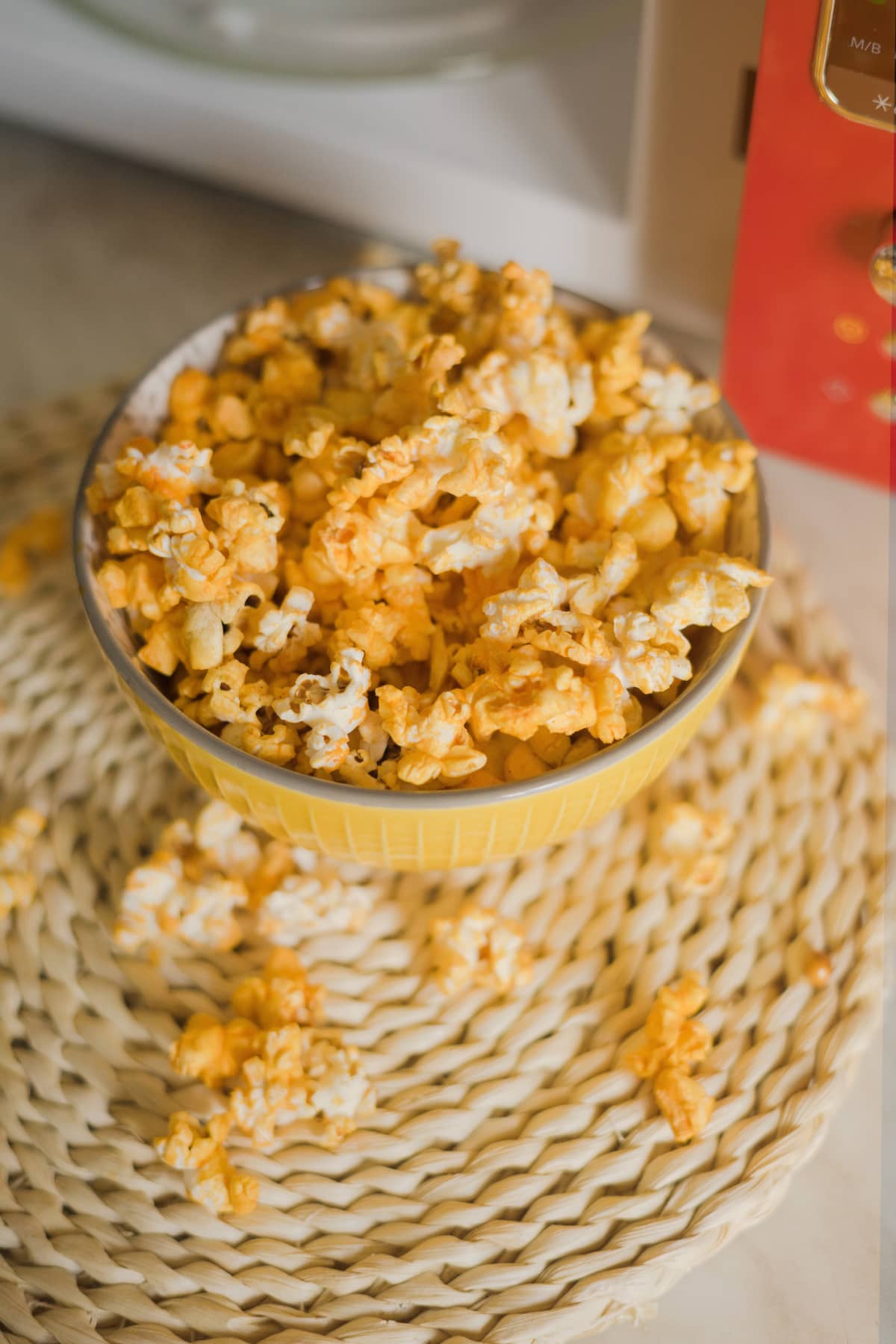 Bowl of popcorn with cheesy seasoning