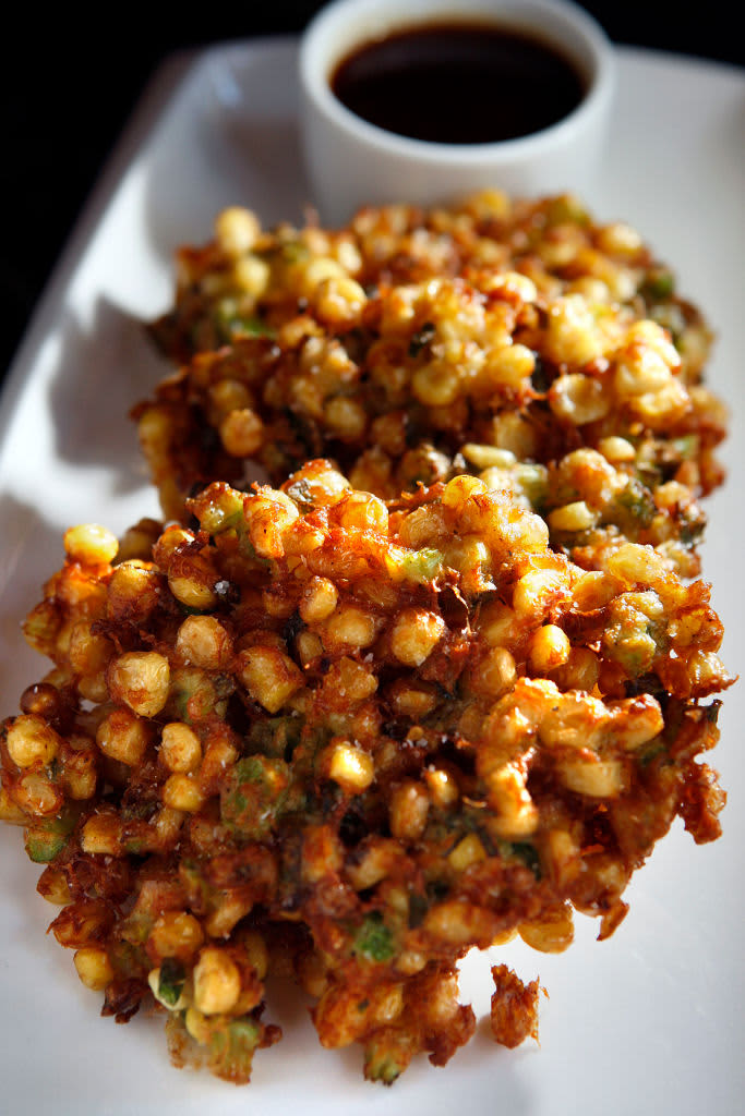 Indonesian corn fritters with sweet chili soy sauce at E & O Trading Company near Union Square in San Francisco, CA, on Monday, November 30, 2009. (Photo By Liz Hafalia/The San Francisco Chronicle via Getty Images)