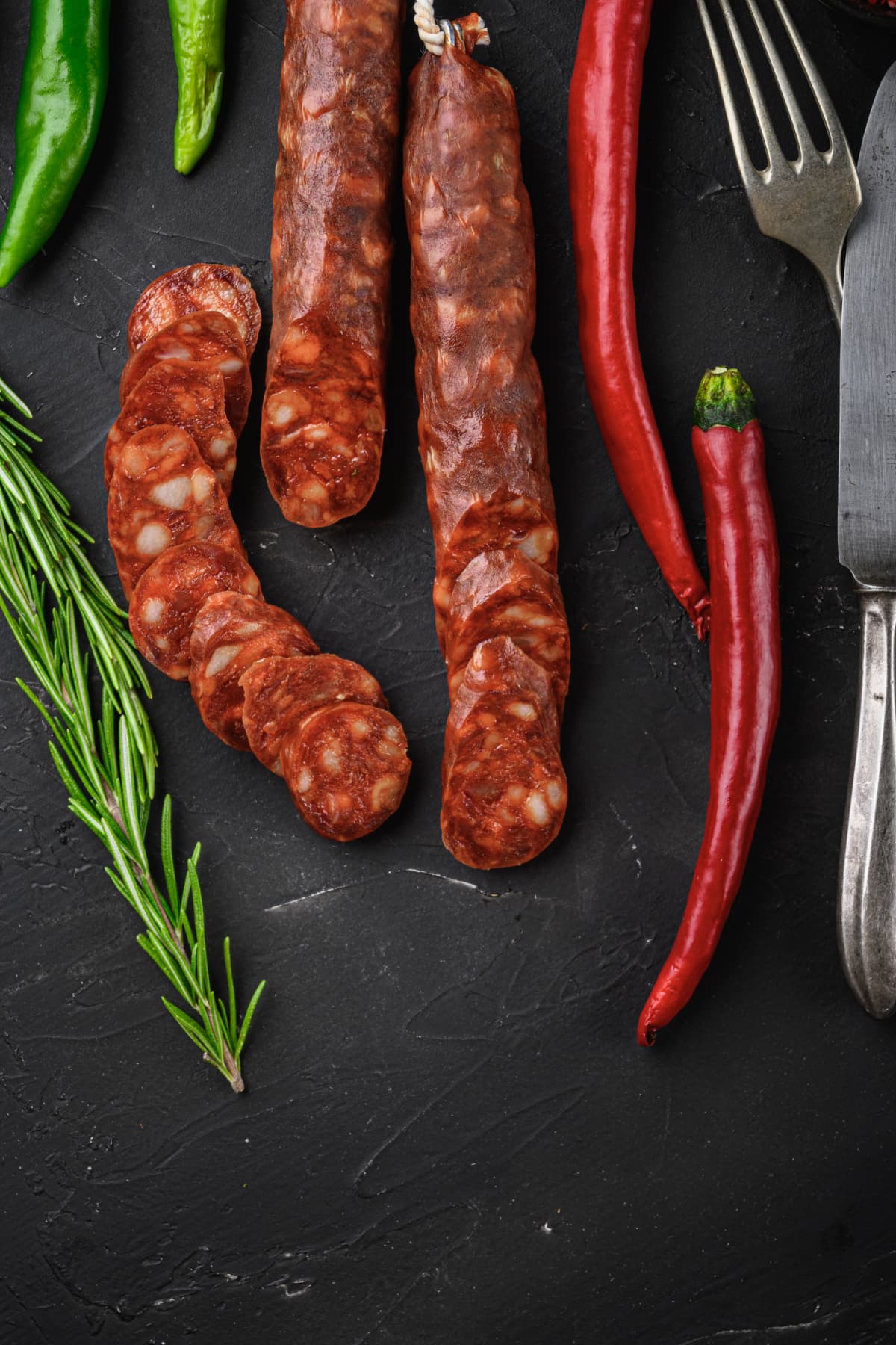 Spanish chorizo sausages with peppers and rosemary