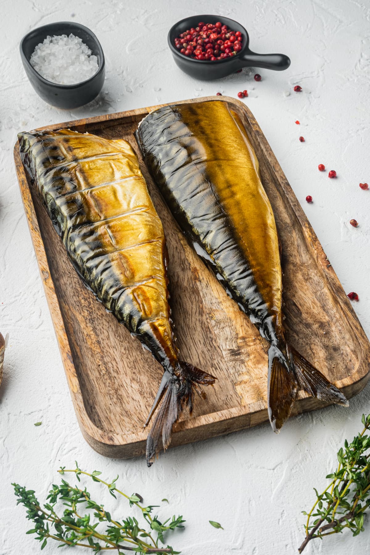 Appetizing smoked fish mackerel, on white background
