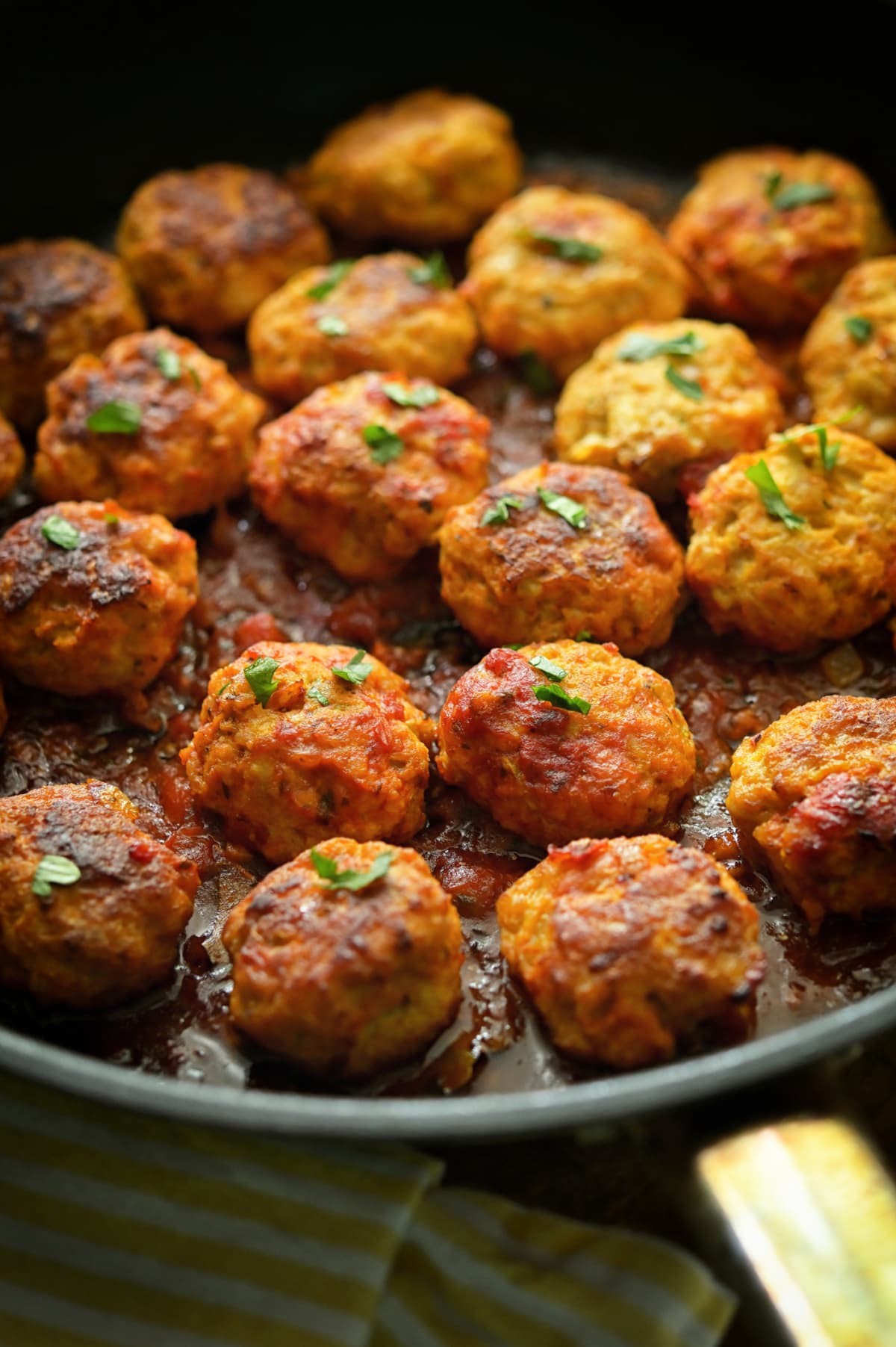 Closeup Meatballs and Tomato Sauce in Pan on table