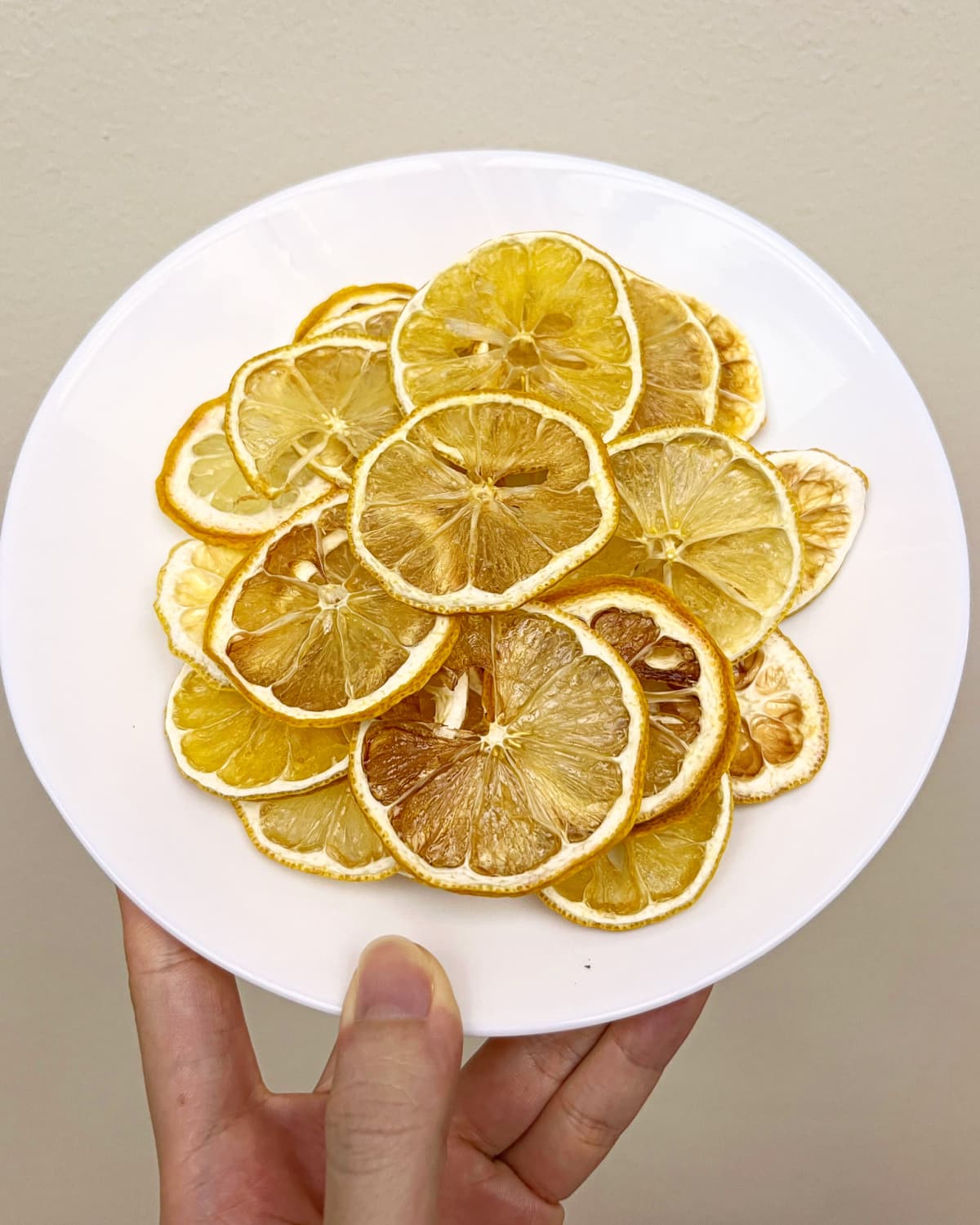 Cured lemon slices on a white plate