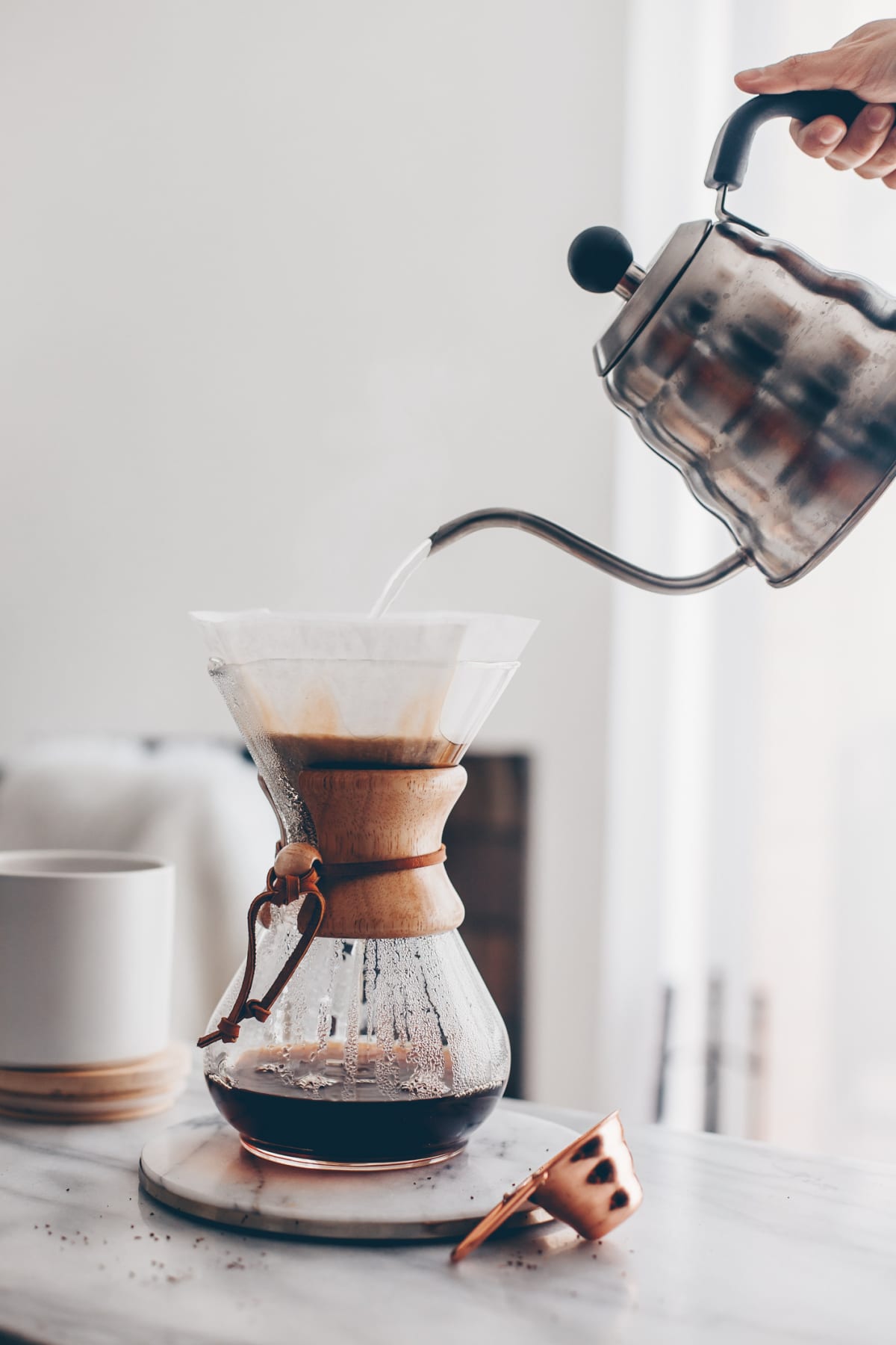 Pouring water into Chemex coffeemaker