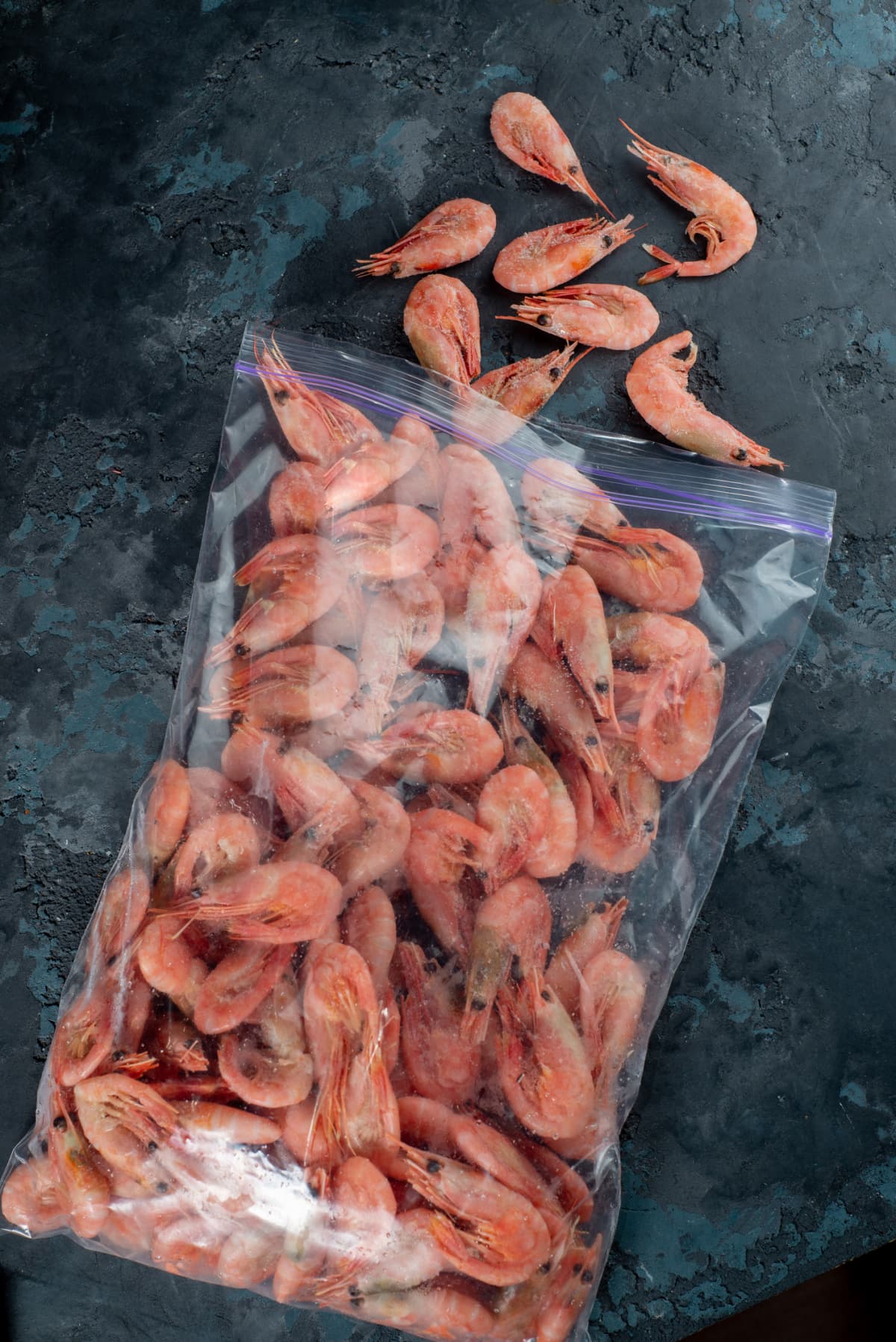 Shrimp falling out of plastic packaging