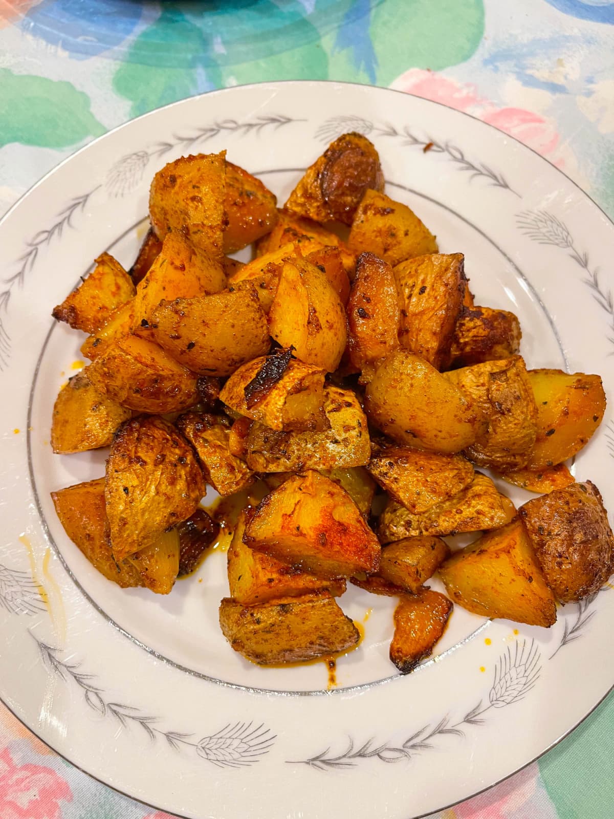 Plate of roasted potato cubes