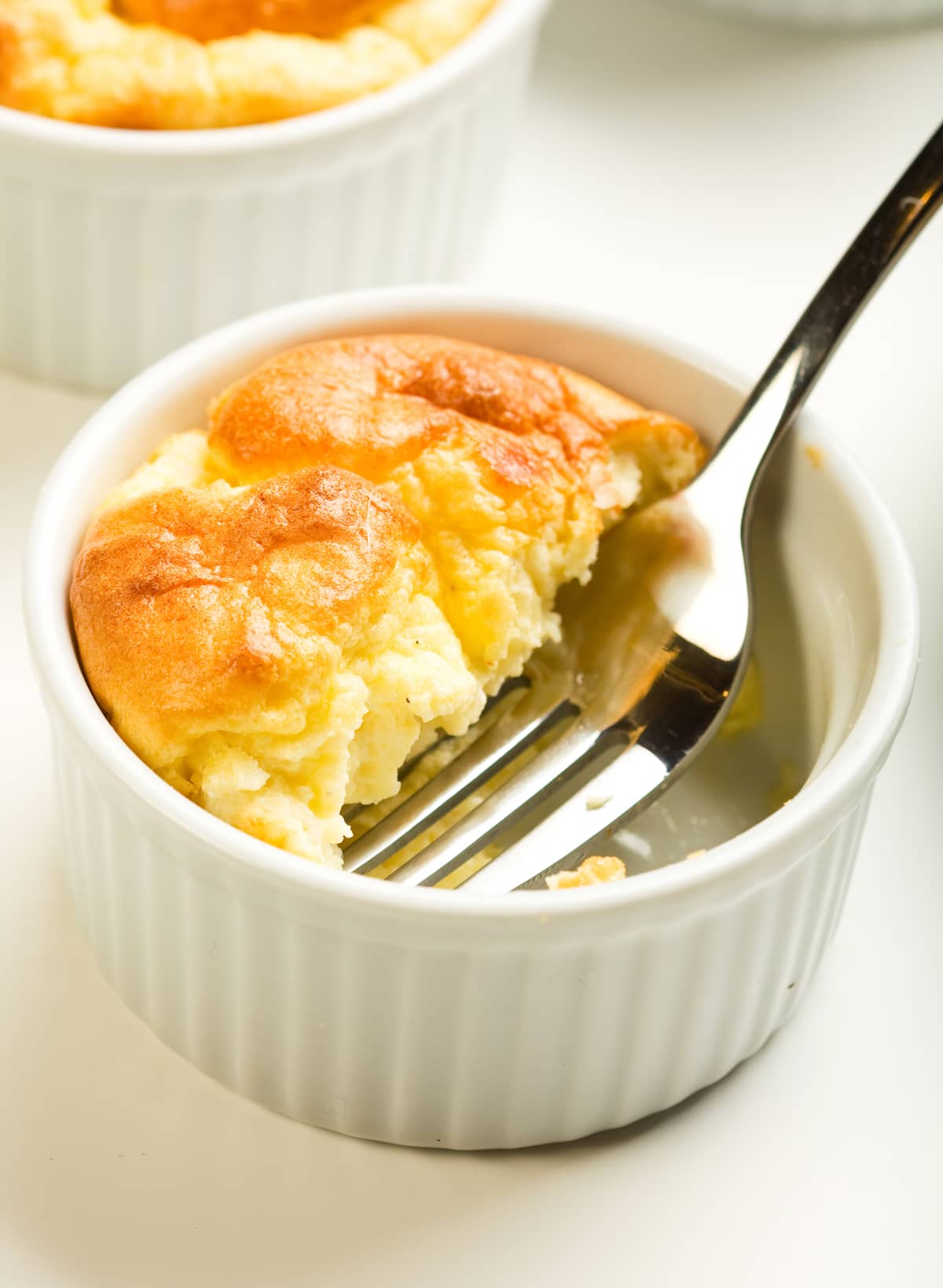 Half eaten souffle with fork