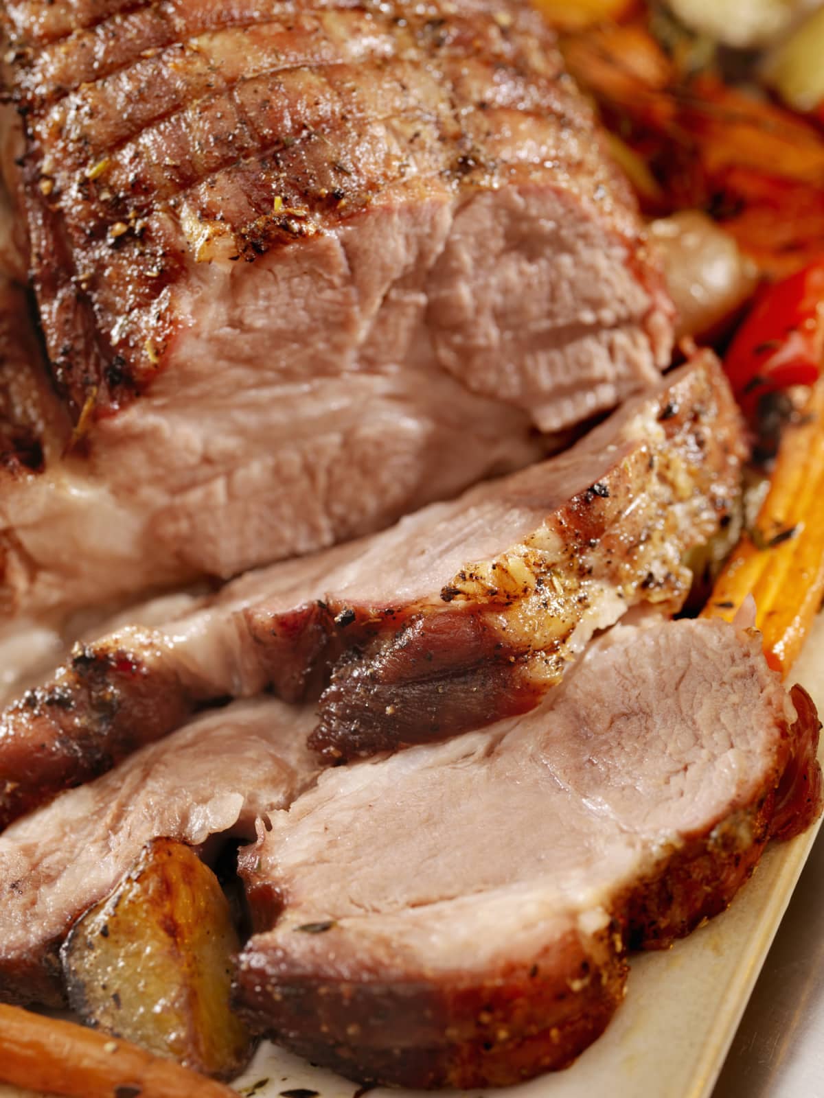 Pork Roast with Roasted Vegetables on a Platter -Photographed on Hasselblad H3D2-39mb Camera