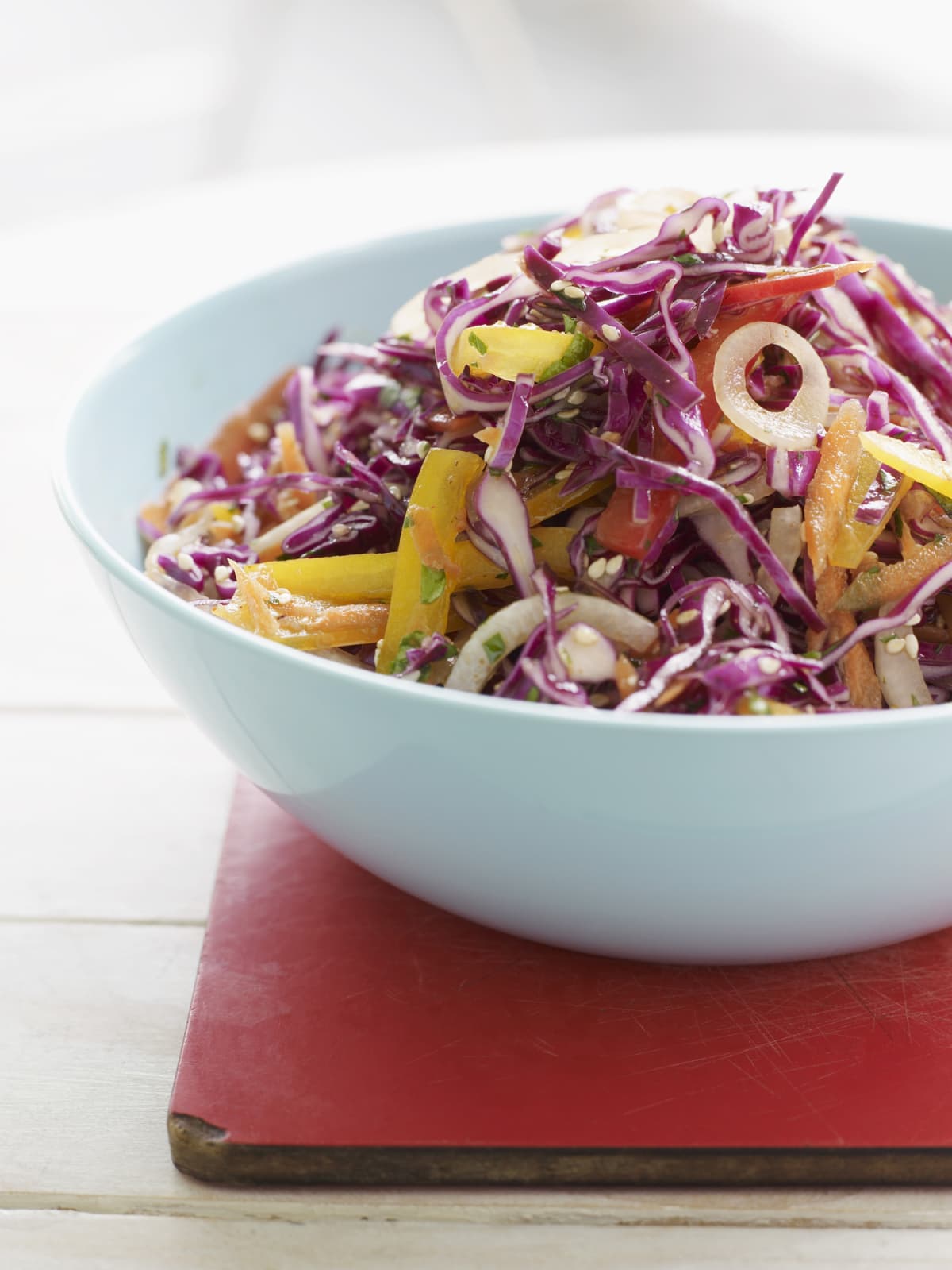 Asian coleslaw in a blue bowl