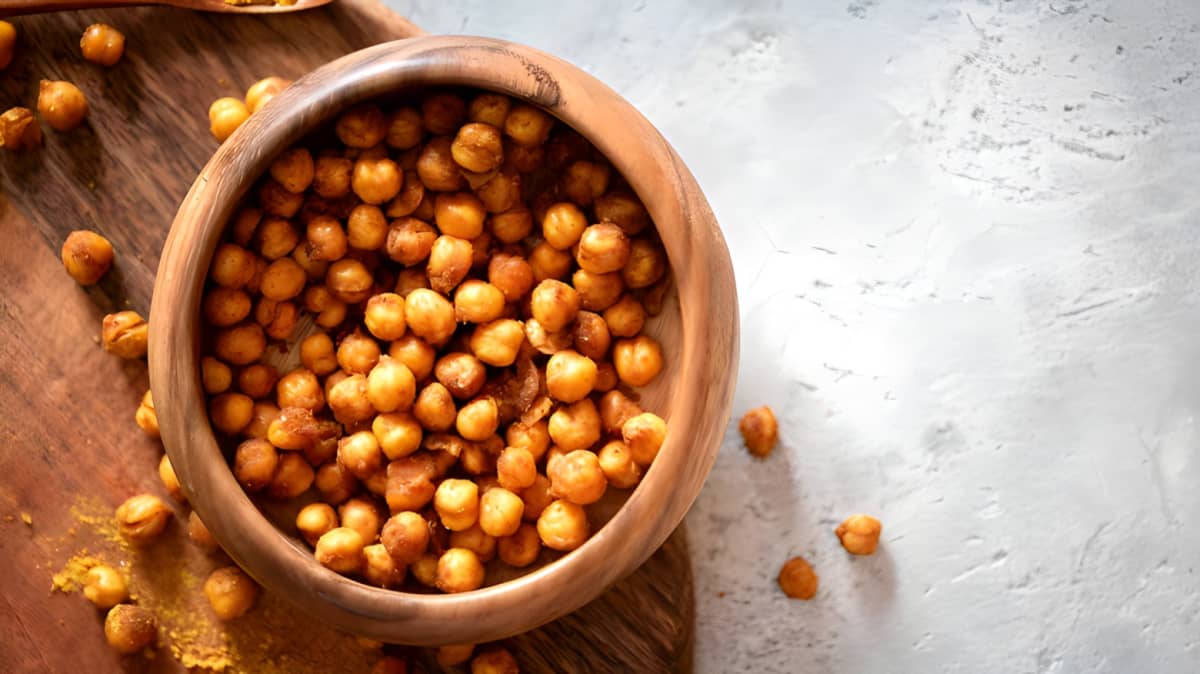 Wooden bowl of roasted chickpeas