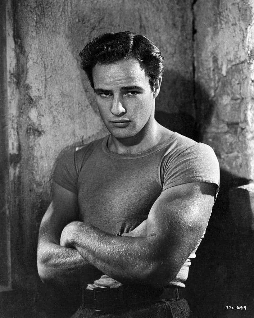 Marlon Brando, in character as Stanley Kowalski from Tennessee Williams' A Streetcar Named Desire. Brando portrayed Kowalski in the 1952 film of the play directed by Elia Kazan.