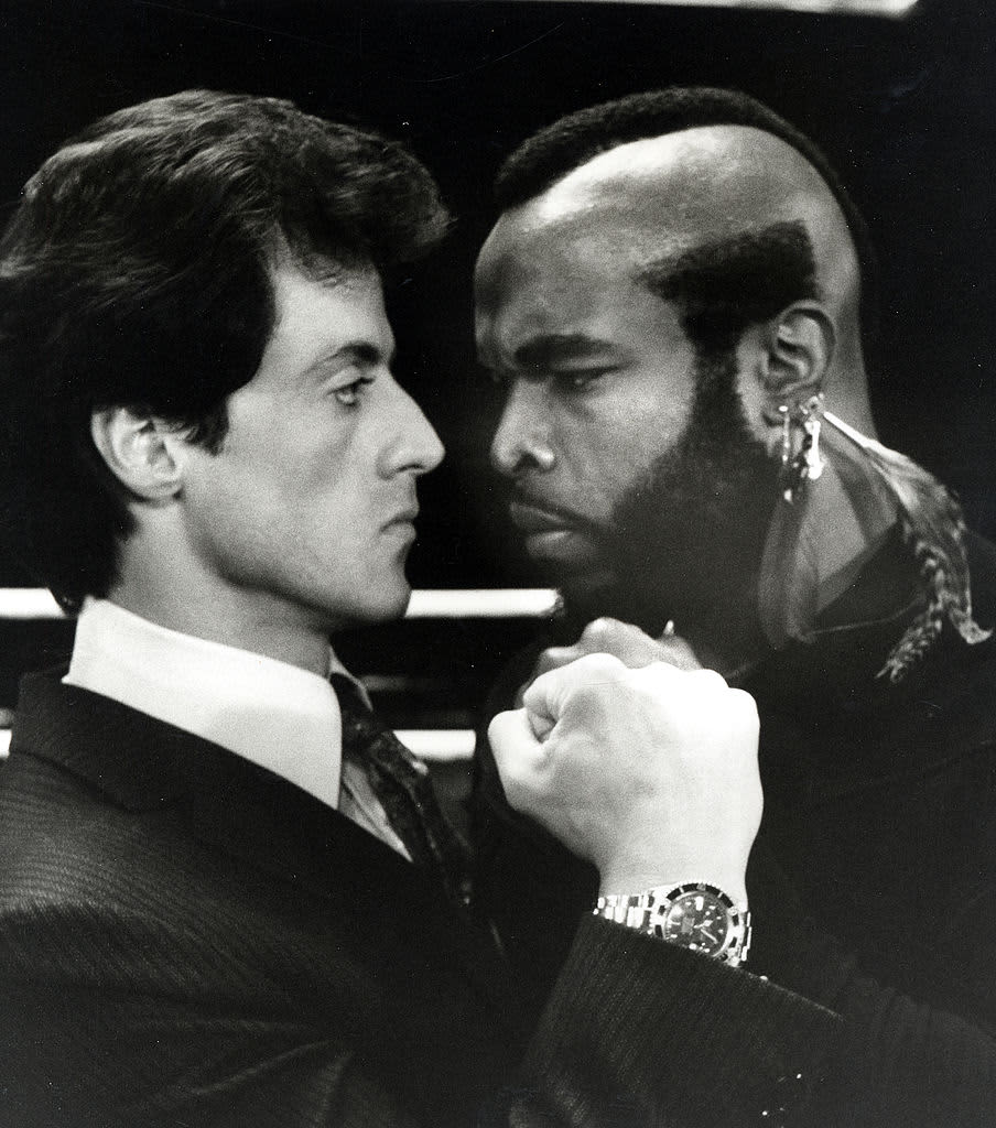 Sylvester Stallone as Rocky and Mr. T as Clubber Lang in Rocky III