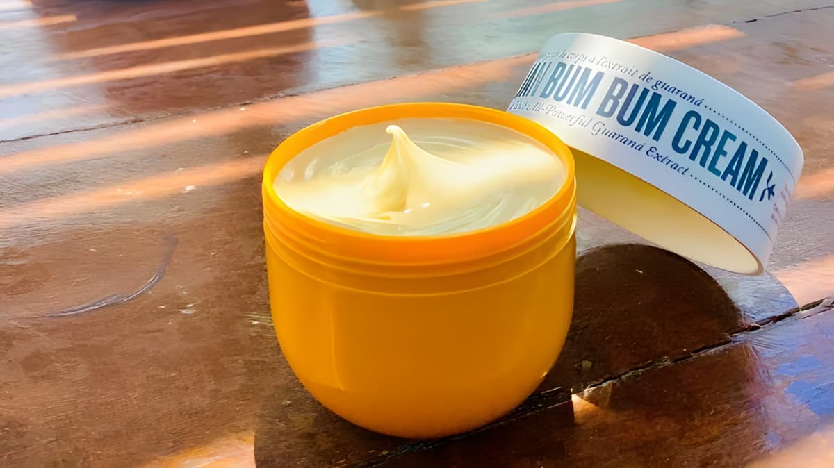A tub of Sol de Janeiro Brazilian Bum Bum Cream with the lid off